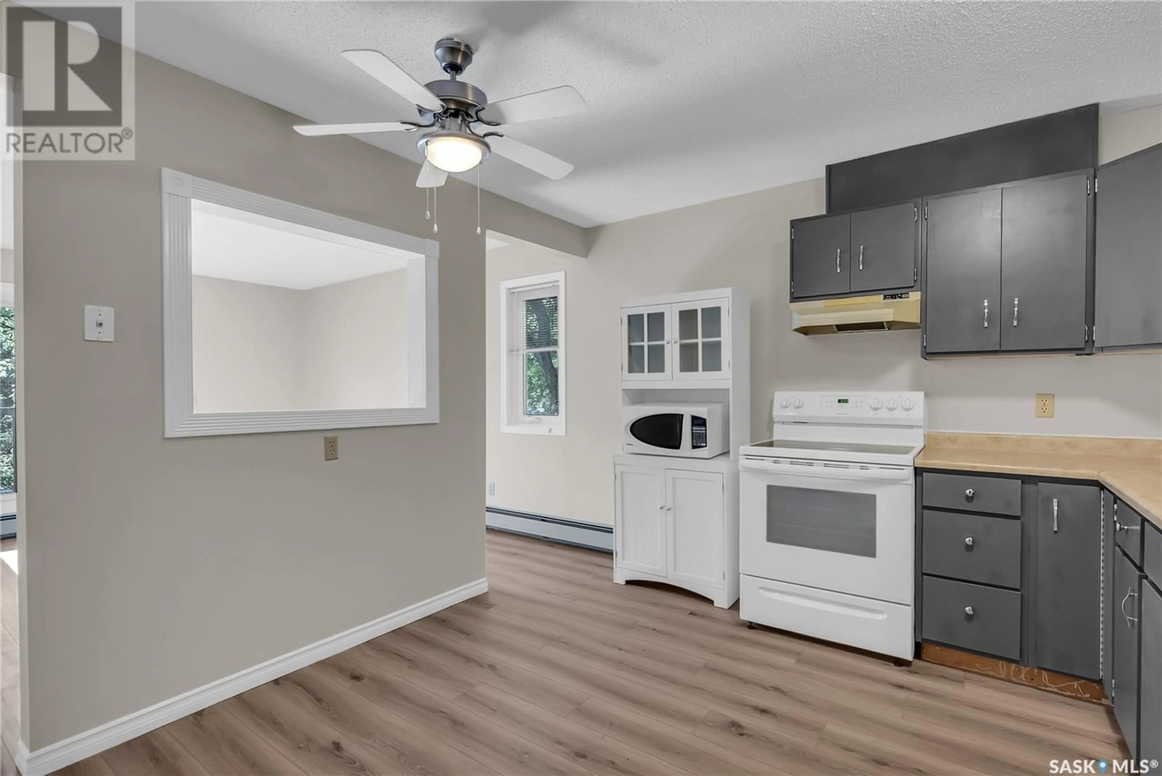 Standard kitchen, wood/laminate floor for 202 - 1006 9TH STREET, Saskatoon Saskatchewan S7H0N2