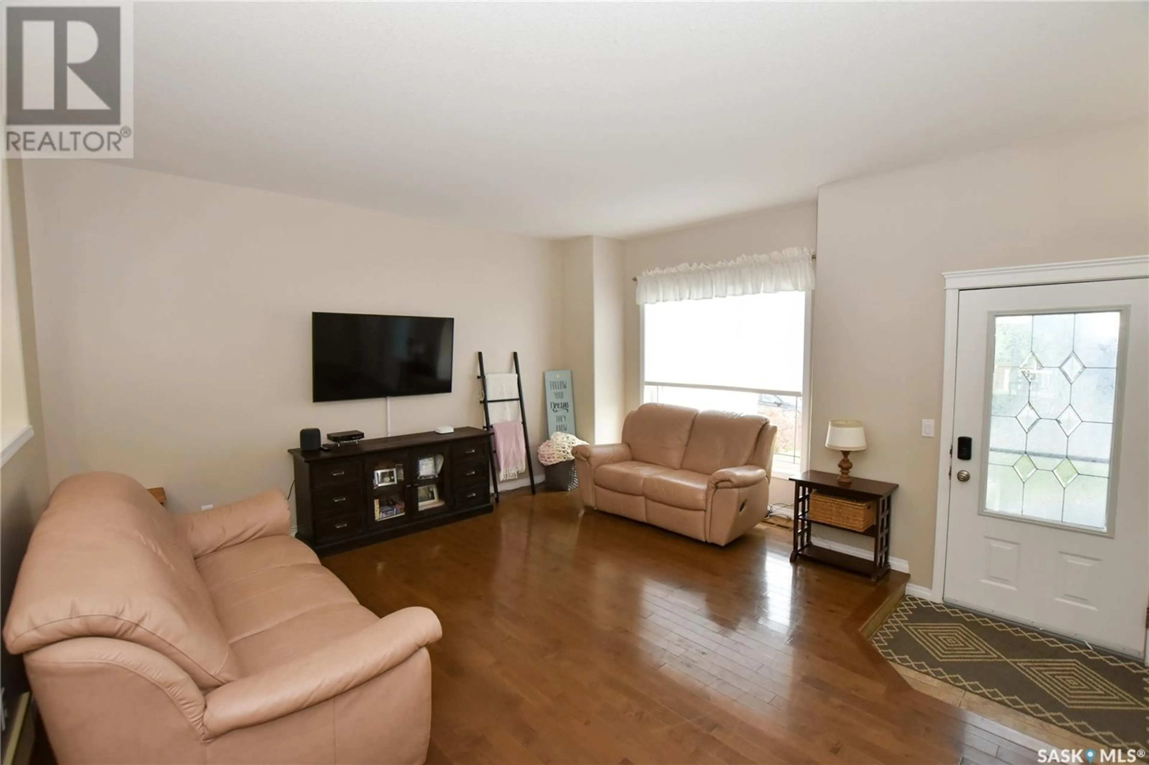 Living room with furniture, unknown for 835 COLUMBIA WAY, Martensville Saskatchewan S0K2T0