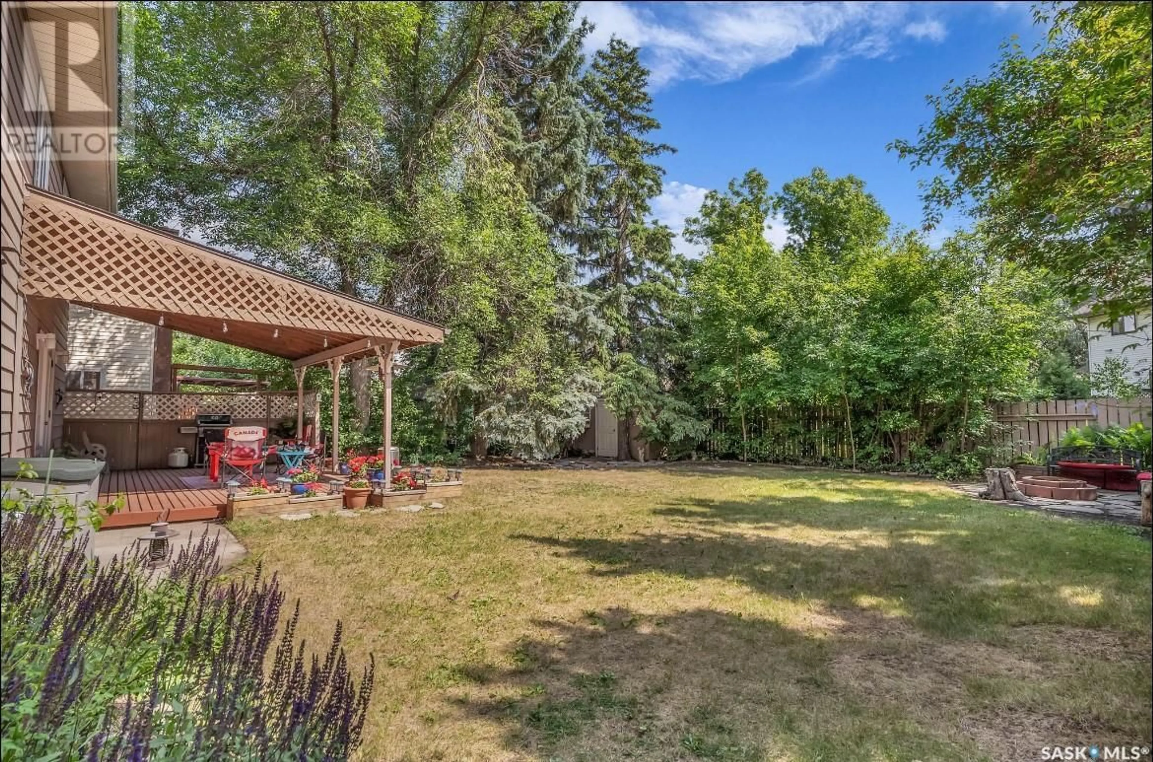 Patio, forest/trees view for 178 WHITESHORE CRESCENT, Saskatoon Saskatchewan S7J3W5