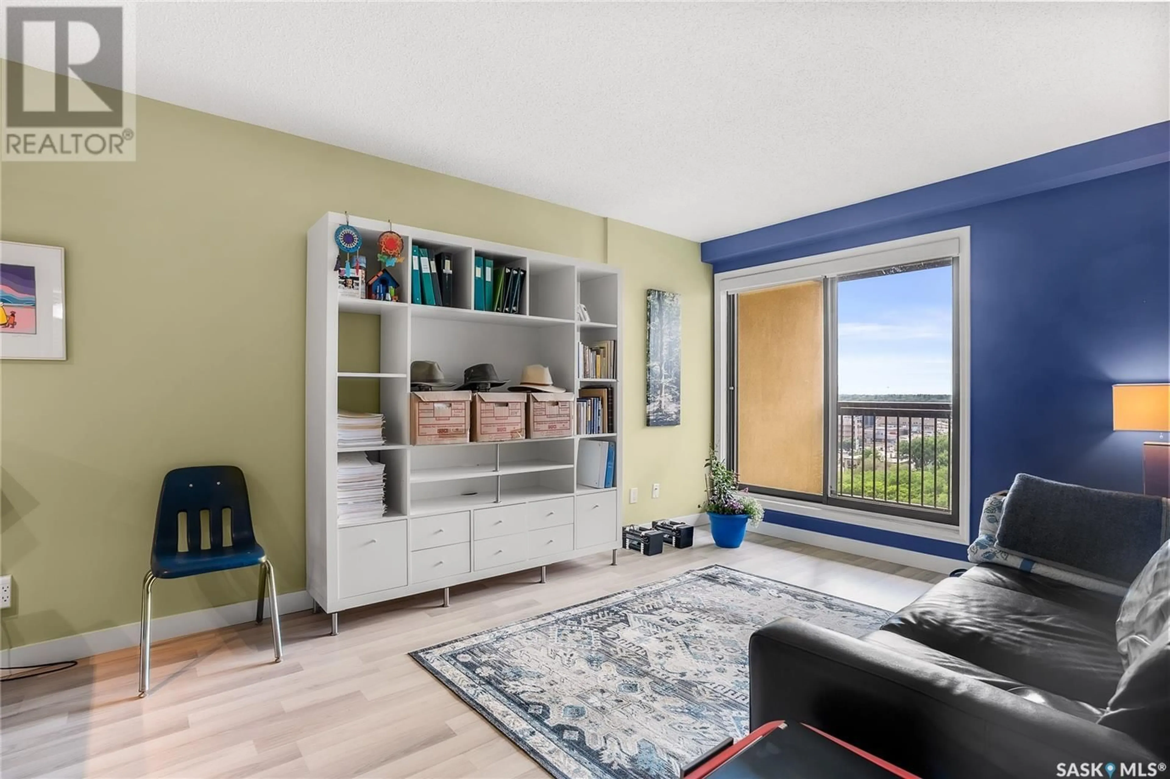 Living room with furniture, wood/laminate floor for 430 - 1405 5TH AVENUE, Saskatoon Saskatchewan S7K6Z2