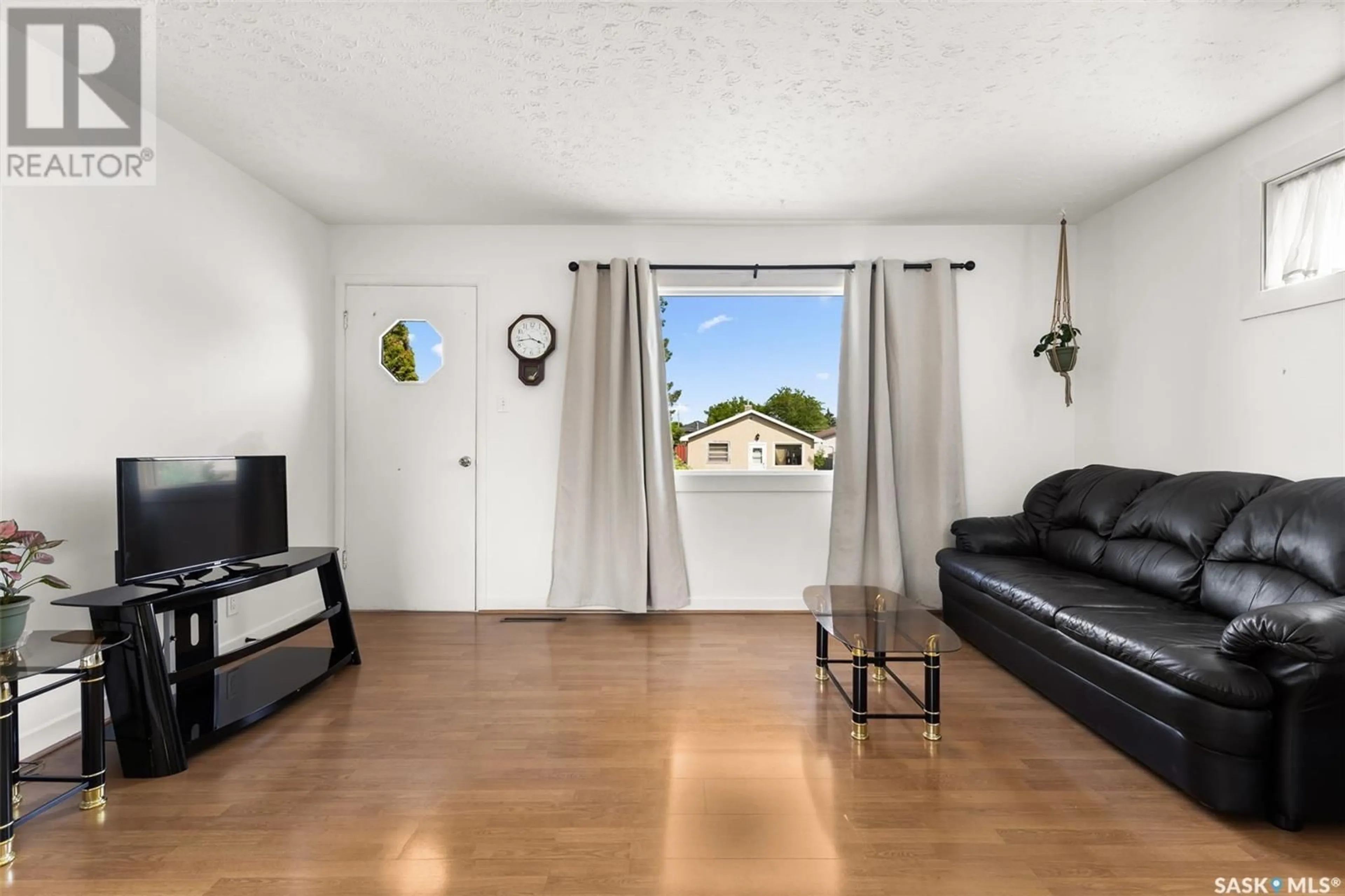 Living room with furniture, unknown for 2064 HARVEY STREET, Regina Saskatchewan S4N2M7