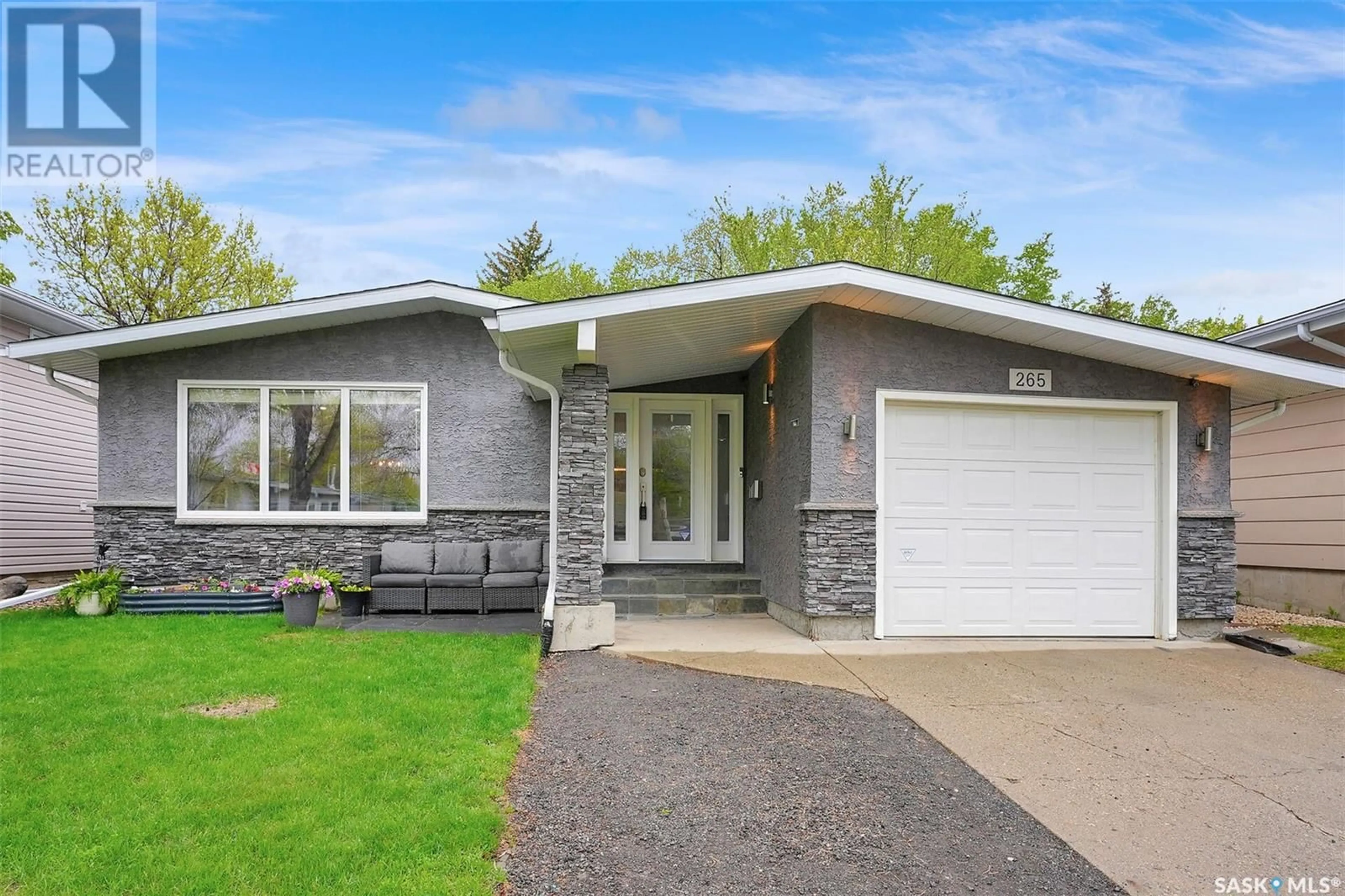 Home with vinyl exterior material, street for 265 HABKIRK DRIVE, Regina Saskatchewan S4S5W1