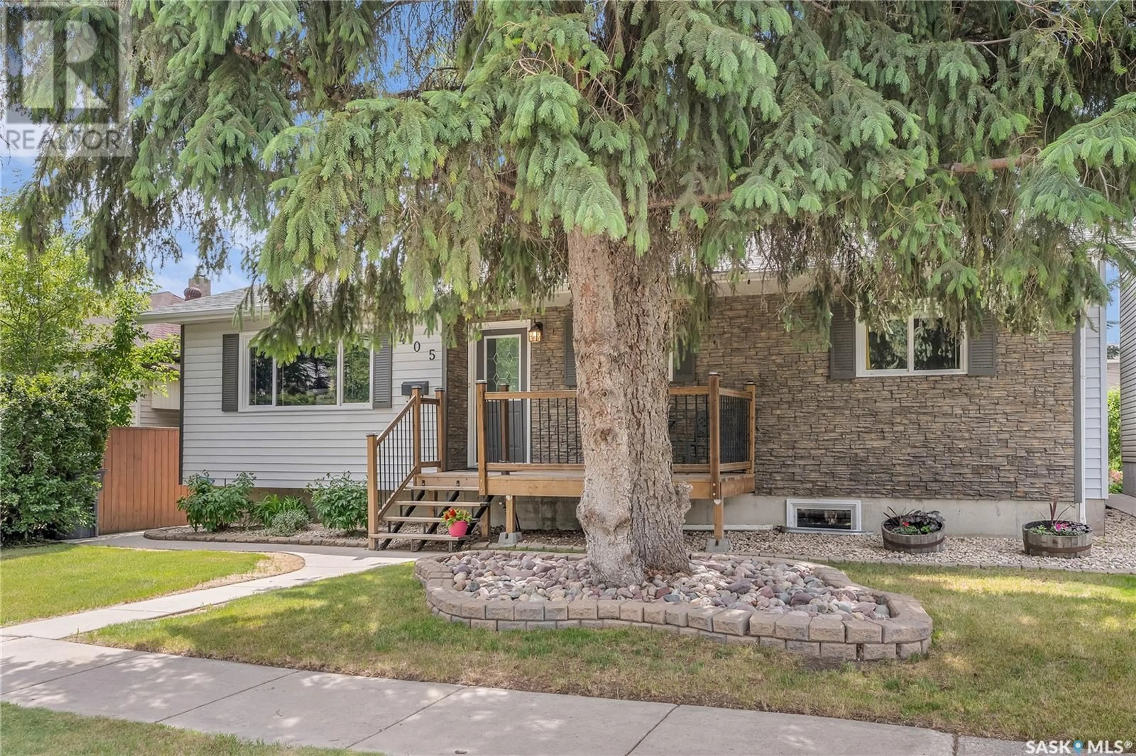 Home with brick exterior material, street for 405 110TH STREET, Saskatoon Saskatchewan S7N1S6