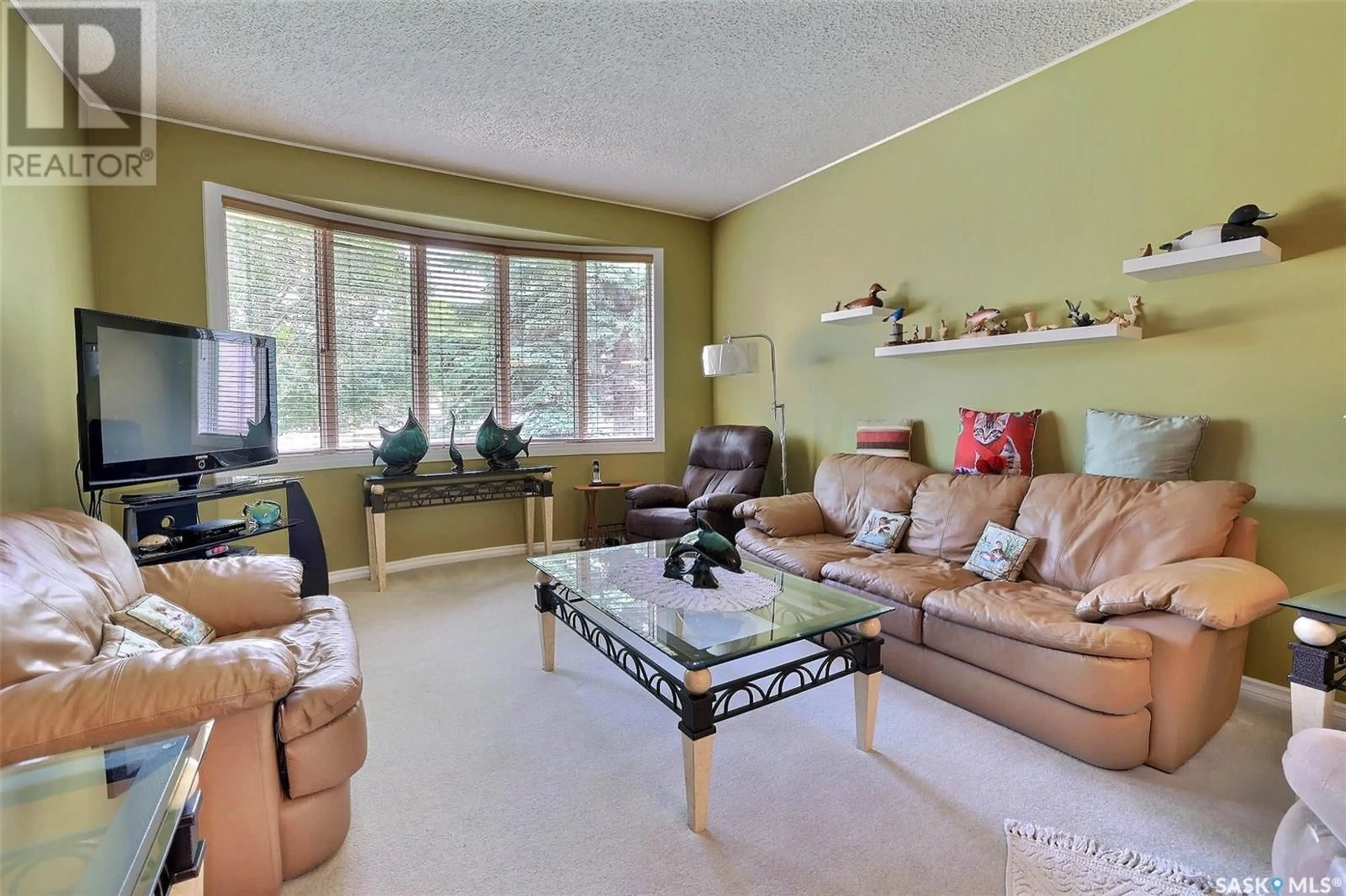 Living room with furniture, unknown for 14 DUNSMORE DRIVE, Regina Saskatchewan S4R7G2