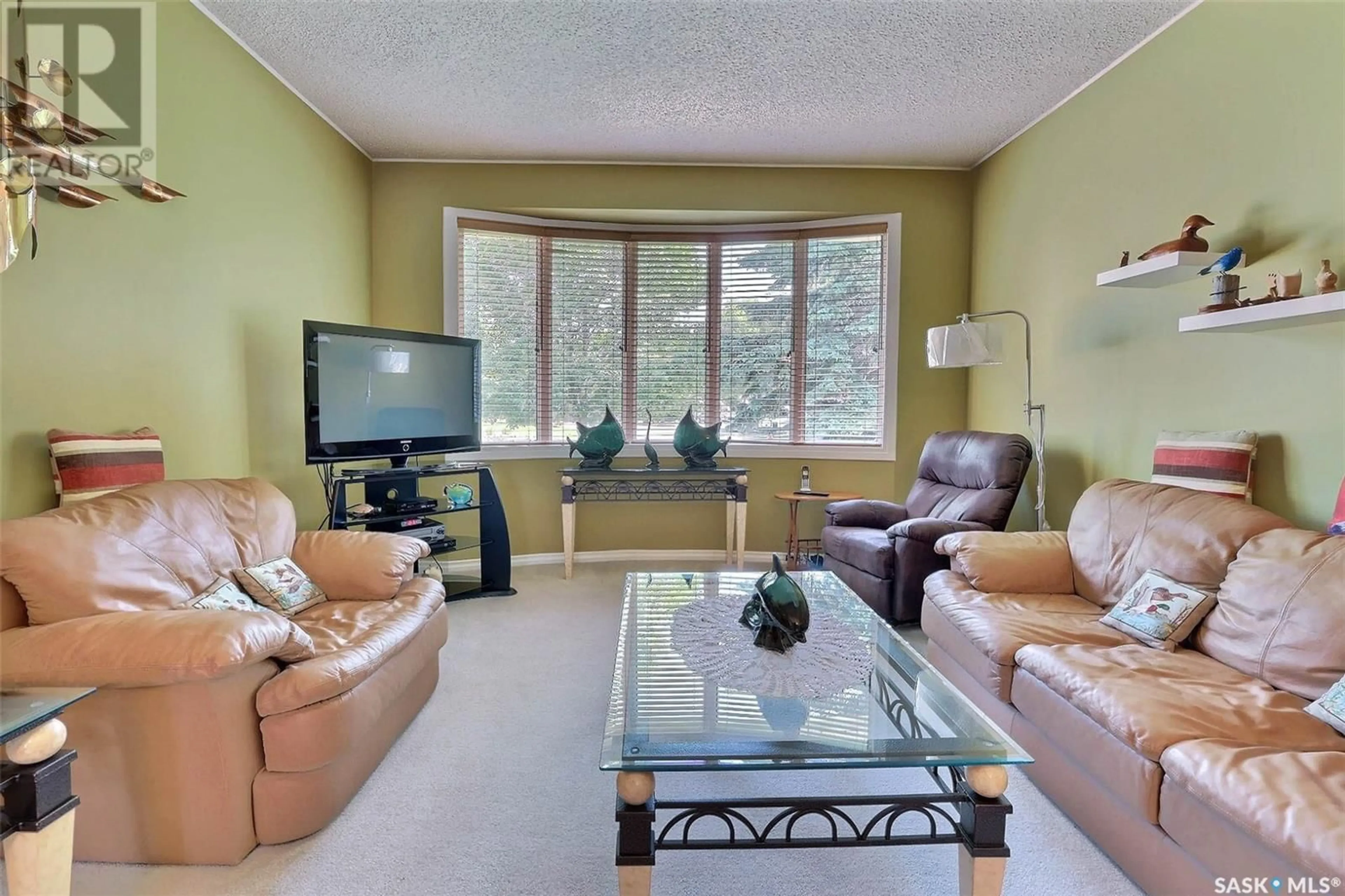 Living room with furniture, unknown for 14 DUNSMORE DRIVE, Regina Saskatchewan S4R7G2