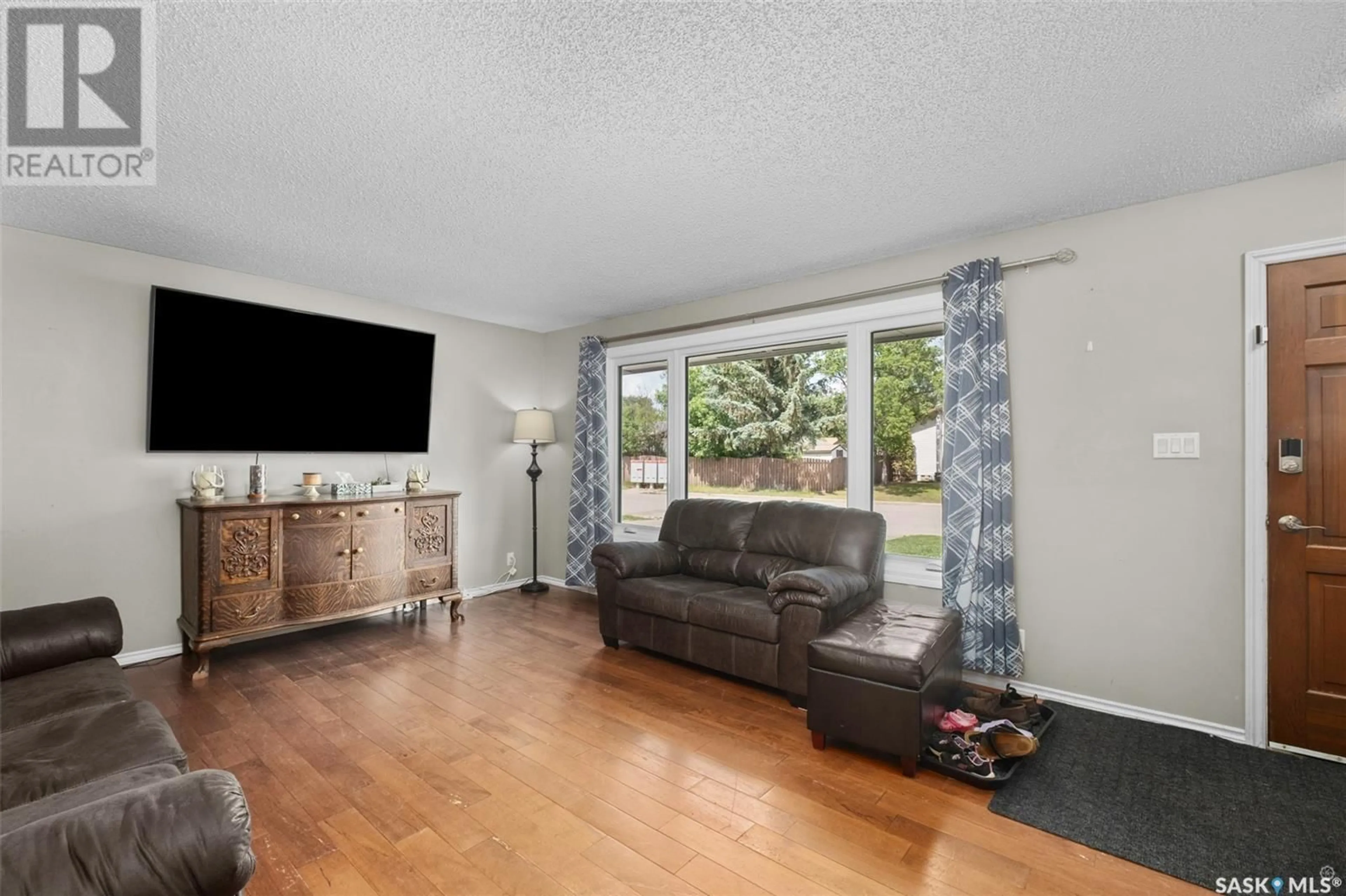 Living room with furniture, unknown for 1582 HELME CRESCENT, Prince Albert Saskatchewan S6V6G7