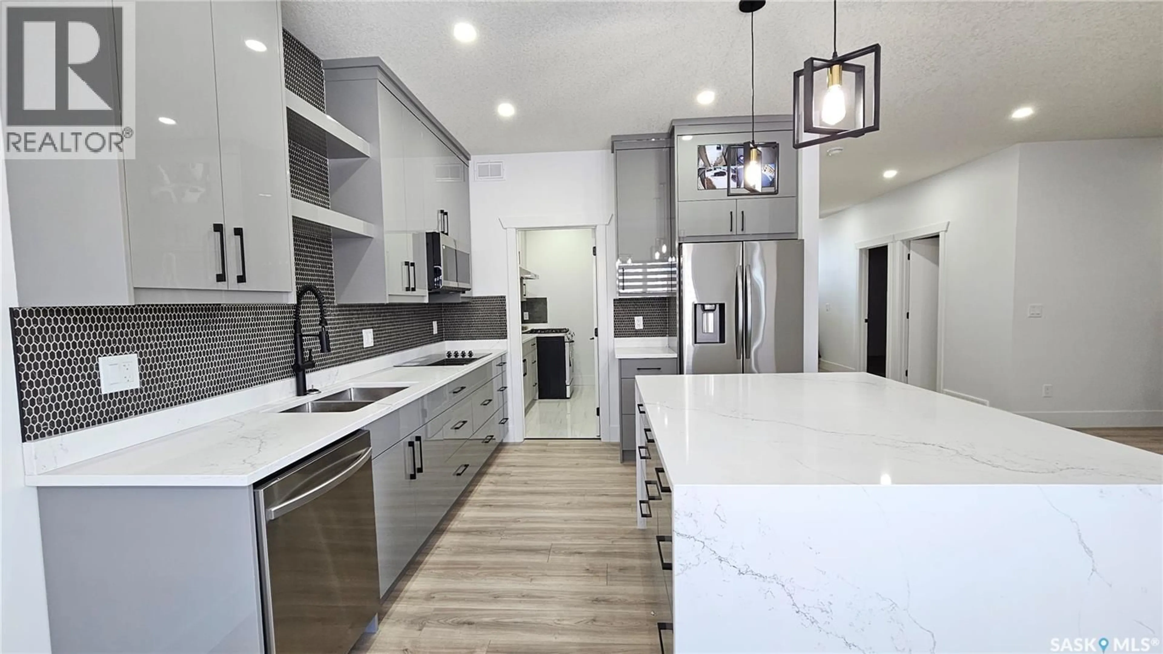 Open concept kitchen, ceramic/tile floor for 371 SHARMA CRESCENT, Saskatoon Saskatchewan S7W1K9