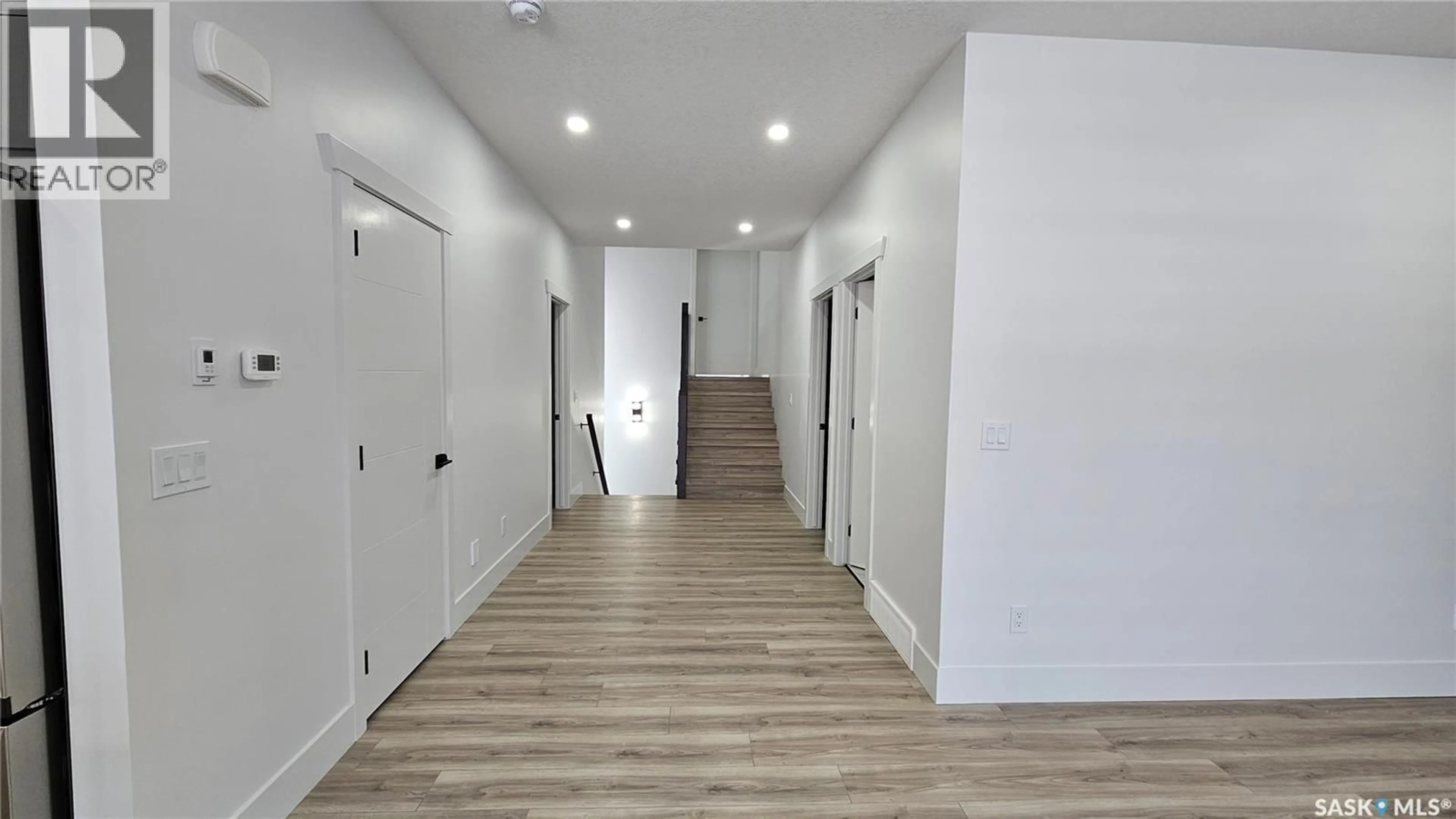 Indoor foyer for 371 SHARMA CRESCENT, Saskatoon Saskatchewan S7W1K9