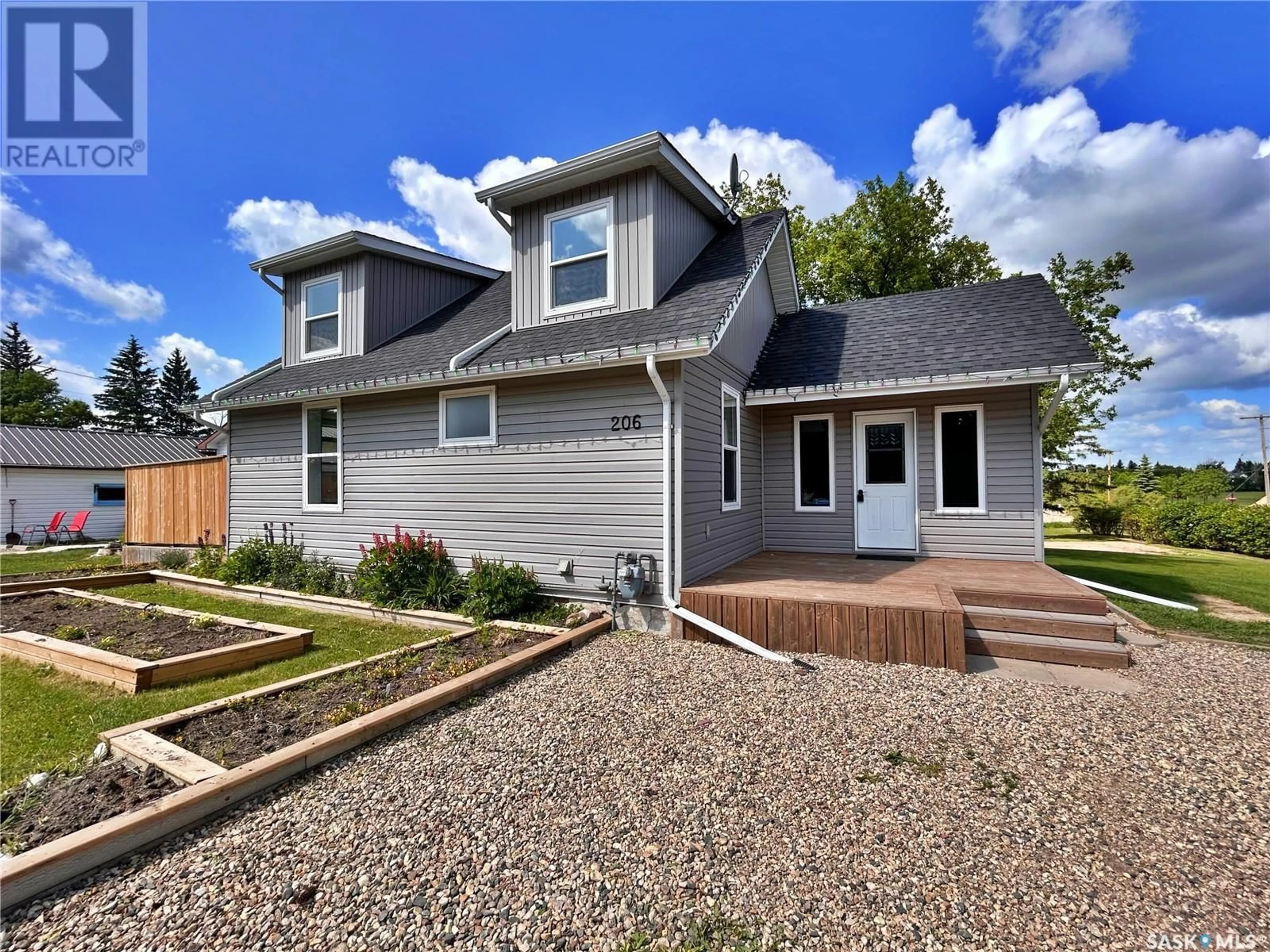 Home with vinyl exterior material, street for 206 1ST STREET, Wawota Saskatchewan S0G5A0