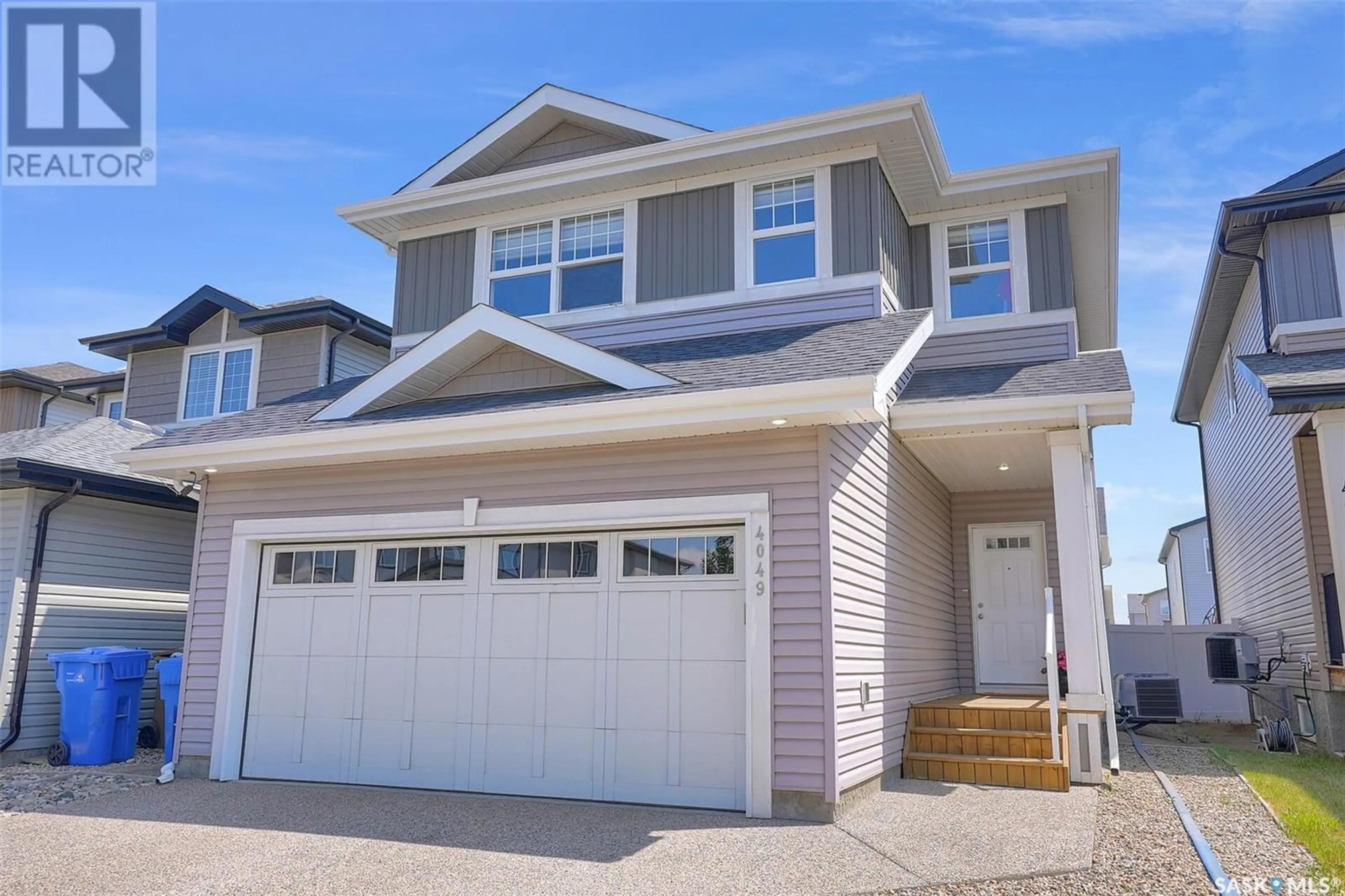 Home with vinyl exterior material, street for 4049 DELHAYE WAY, Regina Saskatchewan S4W0N3