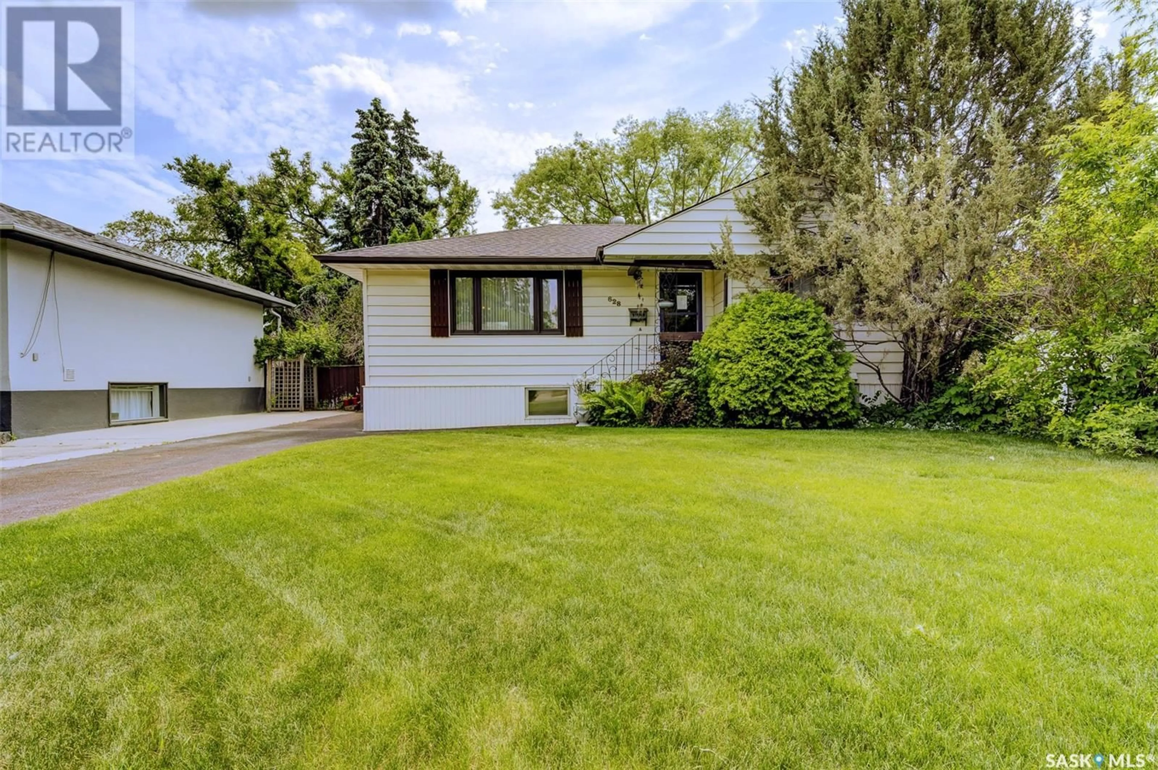 Home with vinyl exterior material, street for 628 2ND STREET, Saskatoon Saskatchewan S7H1P4