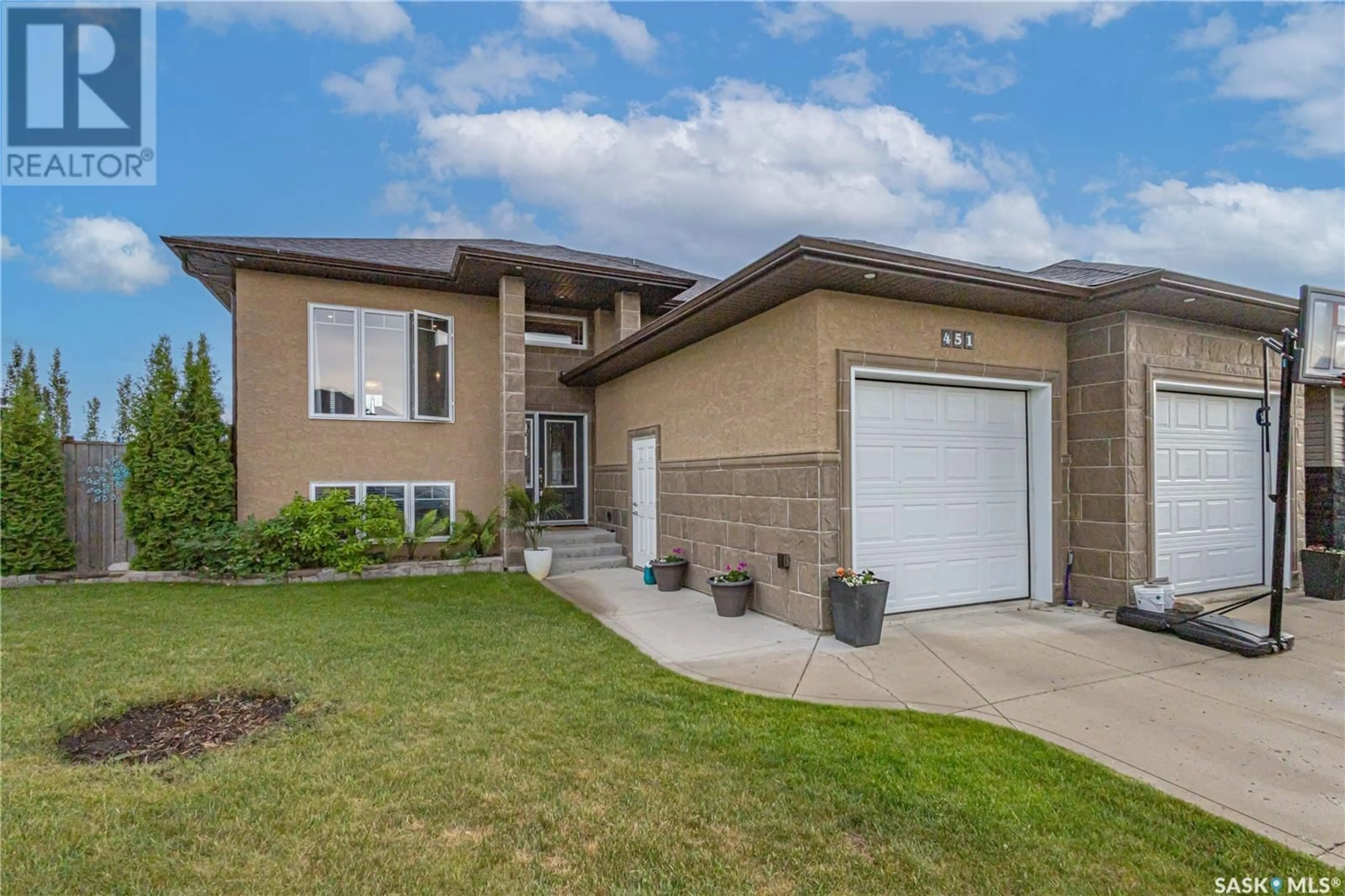 Home with brick exterior material, street for 451 SNEAD CRESCENT, Warman Saskatchewan S0K4S1