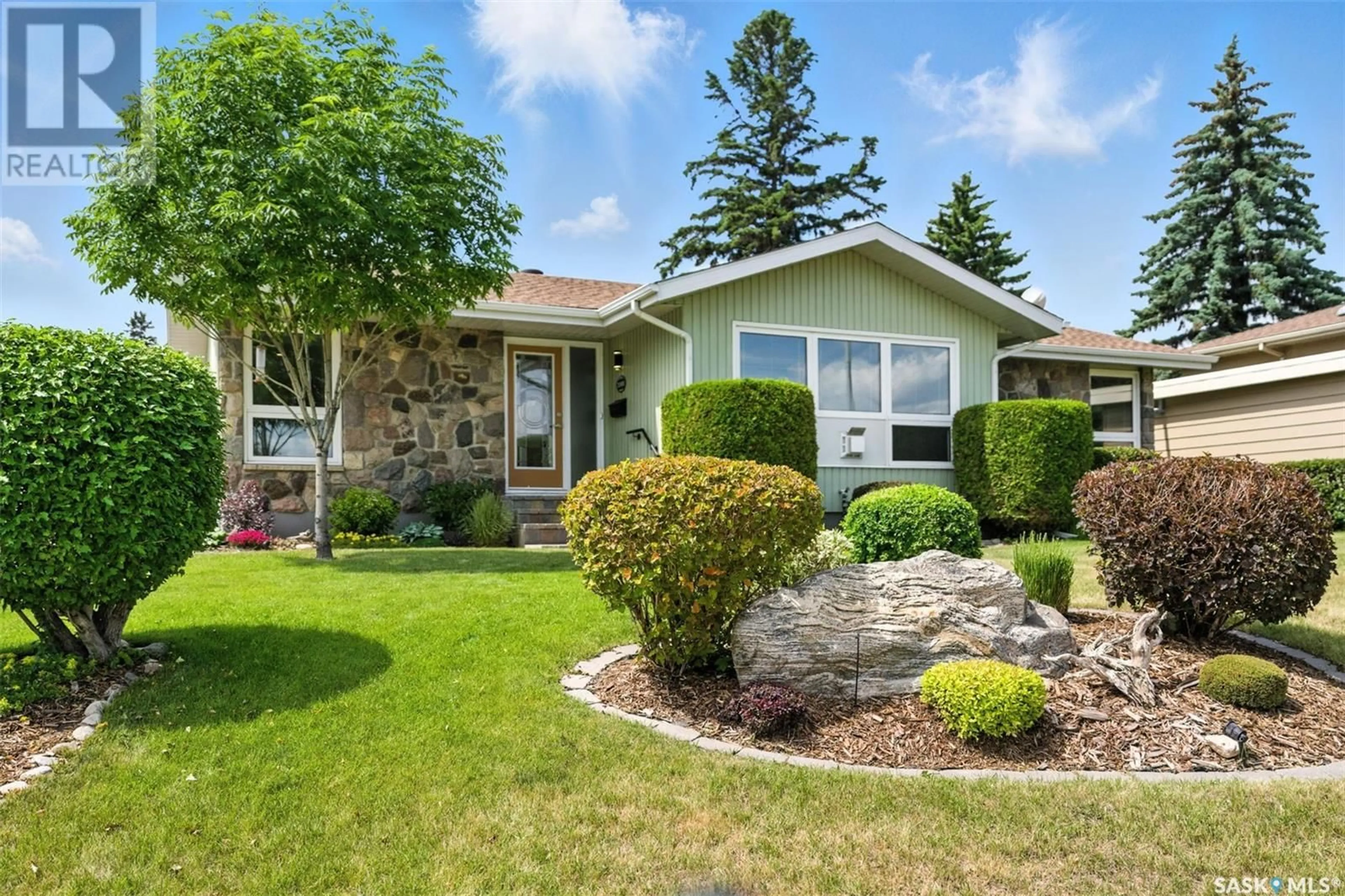 Home with vinyl exterior material, street for 2101 PEMBINA AVENUE, Saskatoon Saskatchewan S7K1C6