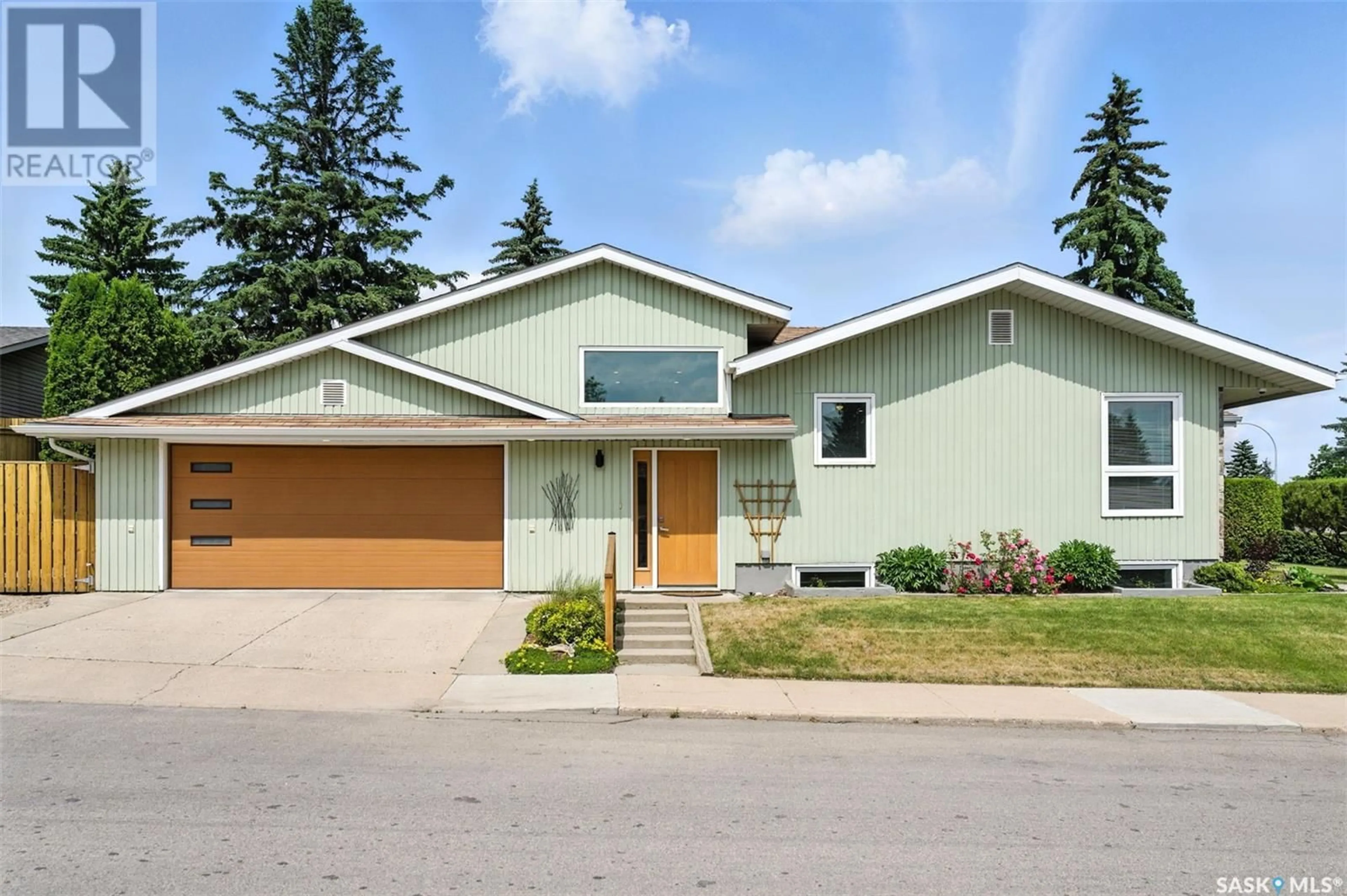 Home with vinyl exterior material, street for 2101 PEMBINA AVENUE, Saskatoon Saskatchewan S7K1C6