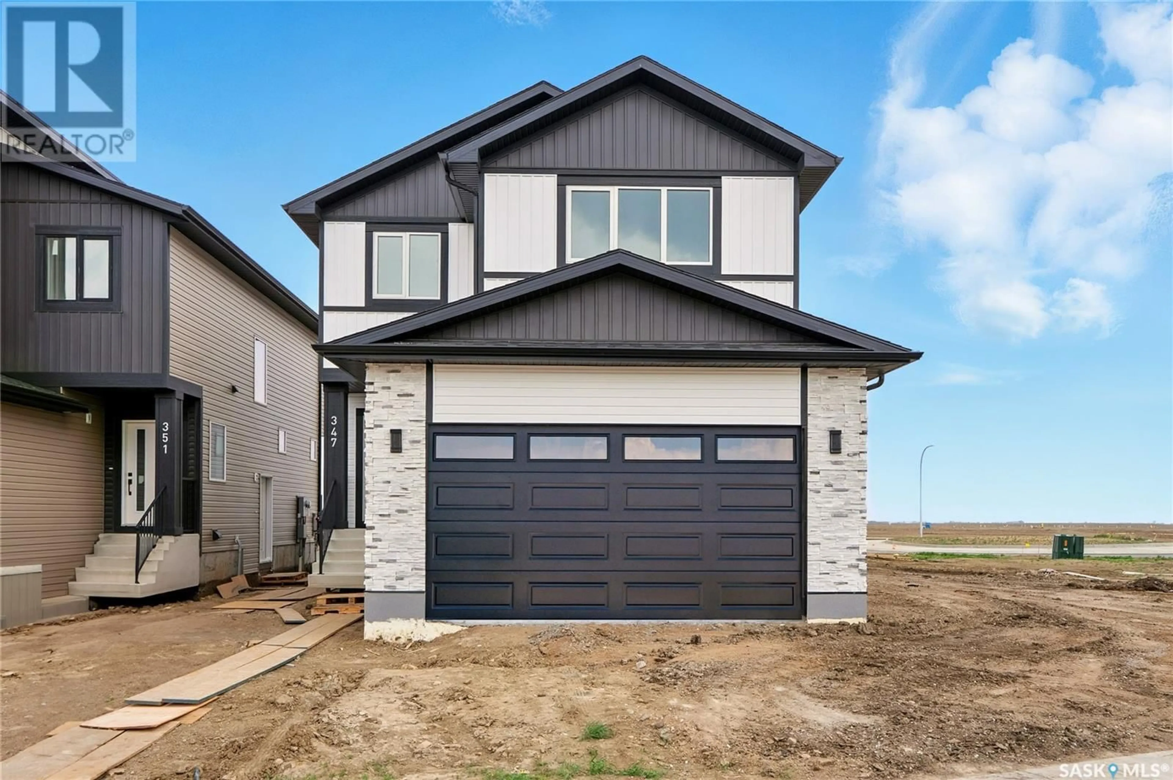 Home with vinyl exterior material, street for 347 SHARMA CRESCENT, Saskatoon Saskatchewan S7W1K9