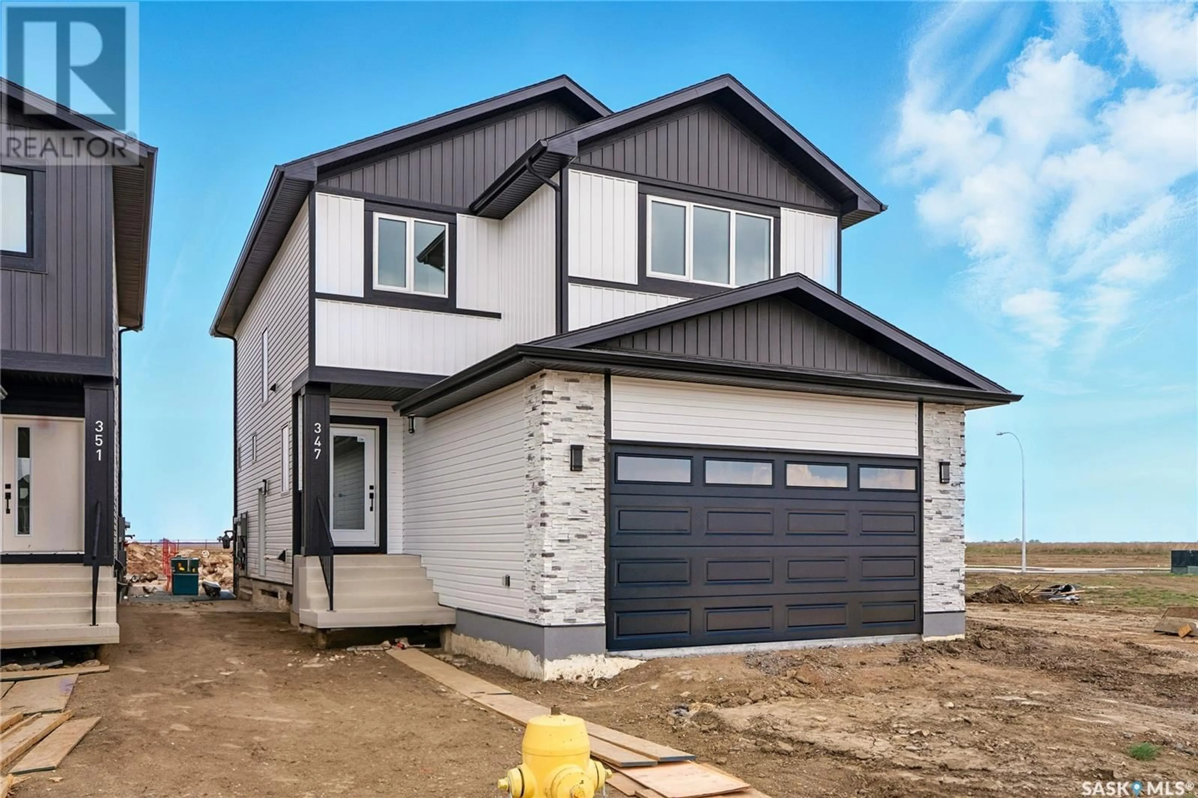 Home with brick exterior material, street for 347 SHARMA CRESCENT, Saskatoon Saskatchewan S7W1K9