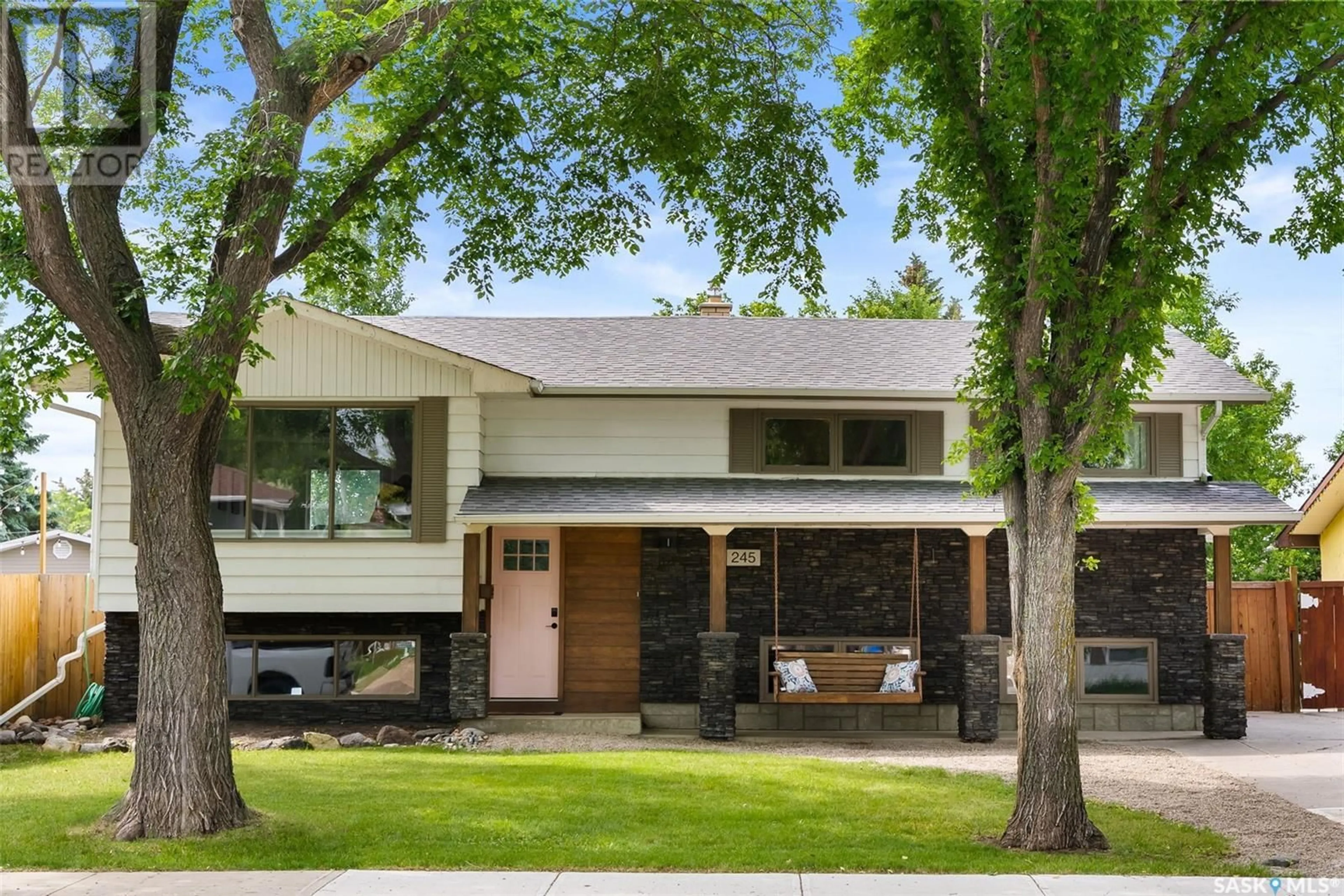 Home with brick exterior material, street for 245 HABKIRK DRIVE, Regina Saskatchewan S4S5W1