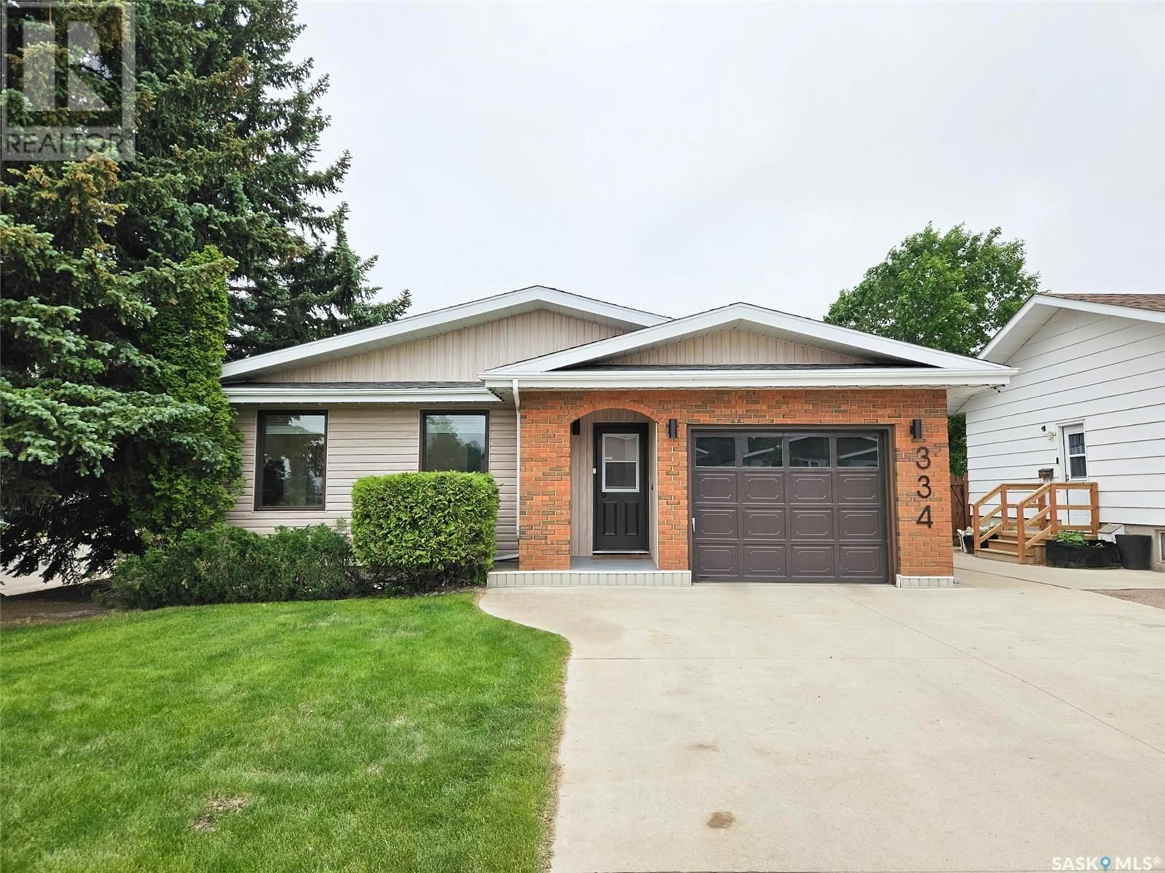Home with brick exterior material, street for 334 POWELL CRESCENT, Swift Current Saskatchewan S9H4L7