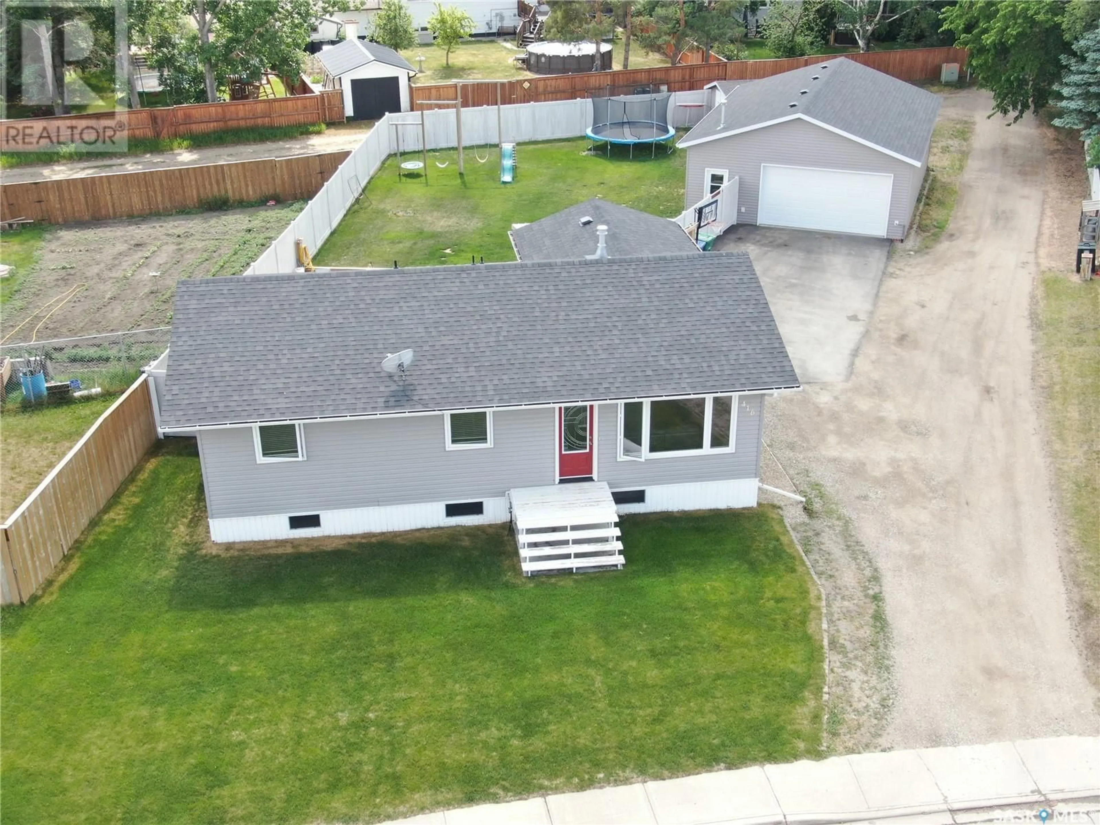 A pic from outside/outdoor area/front of a property/back of a property/a pic from drone, street for 416 6TH AVENUE, Biggar Saskatchewan S0K0M0