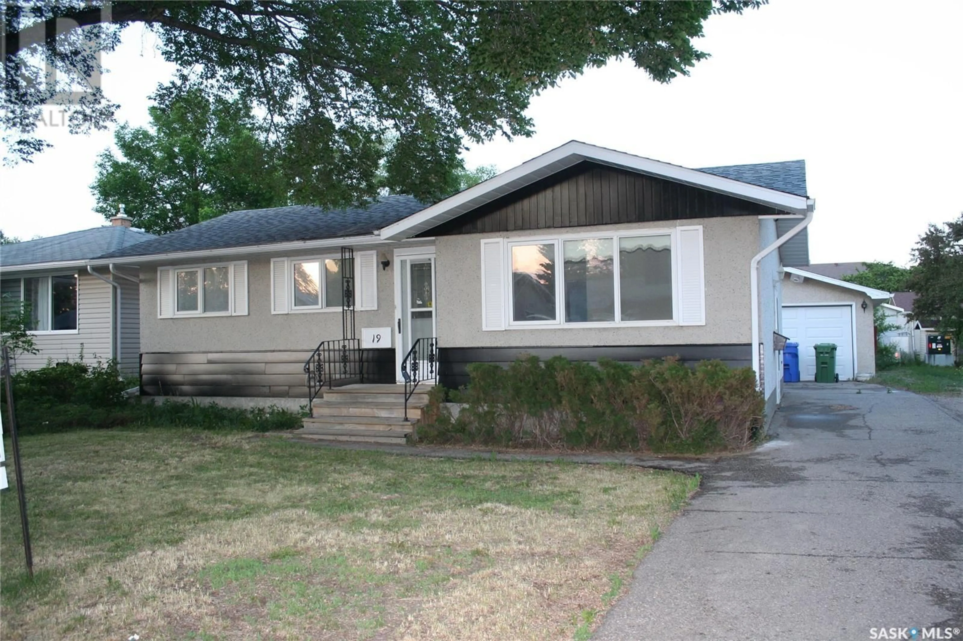 Home with vinyl exterior material, street for 19 MERLIN CRESCENT, Regina Saskatchewan S4R3E7