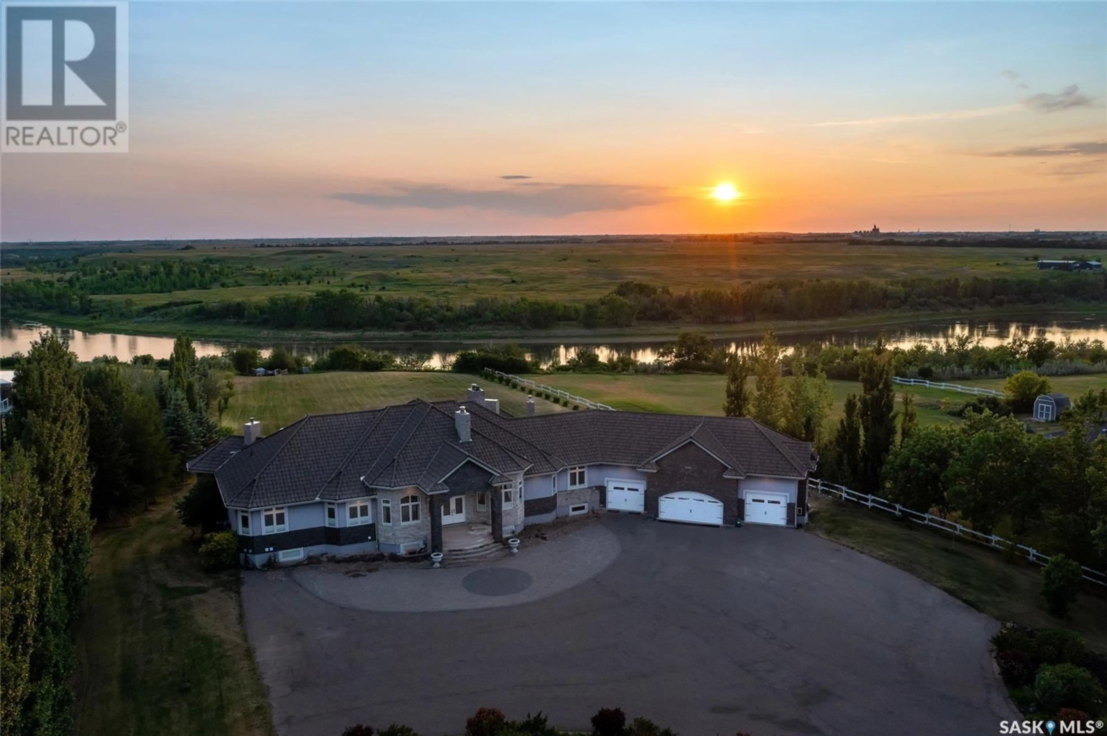 A pic from outside/outdoor area/front of a property/back of a property/a pic from drone, water/lake/river/ocean view for 72 RIVERS EDGE LANE, Corman Park Rm No. 344 Saskatchewan S7K3J9
