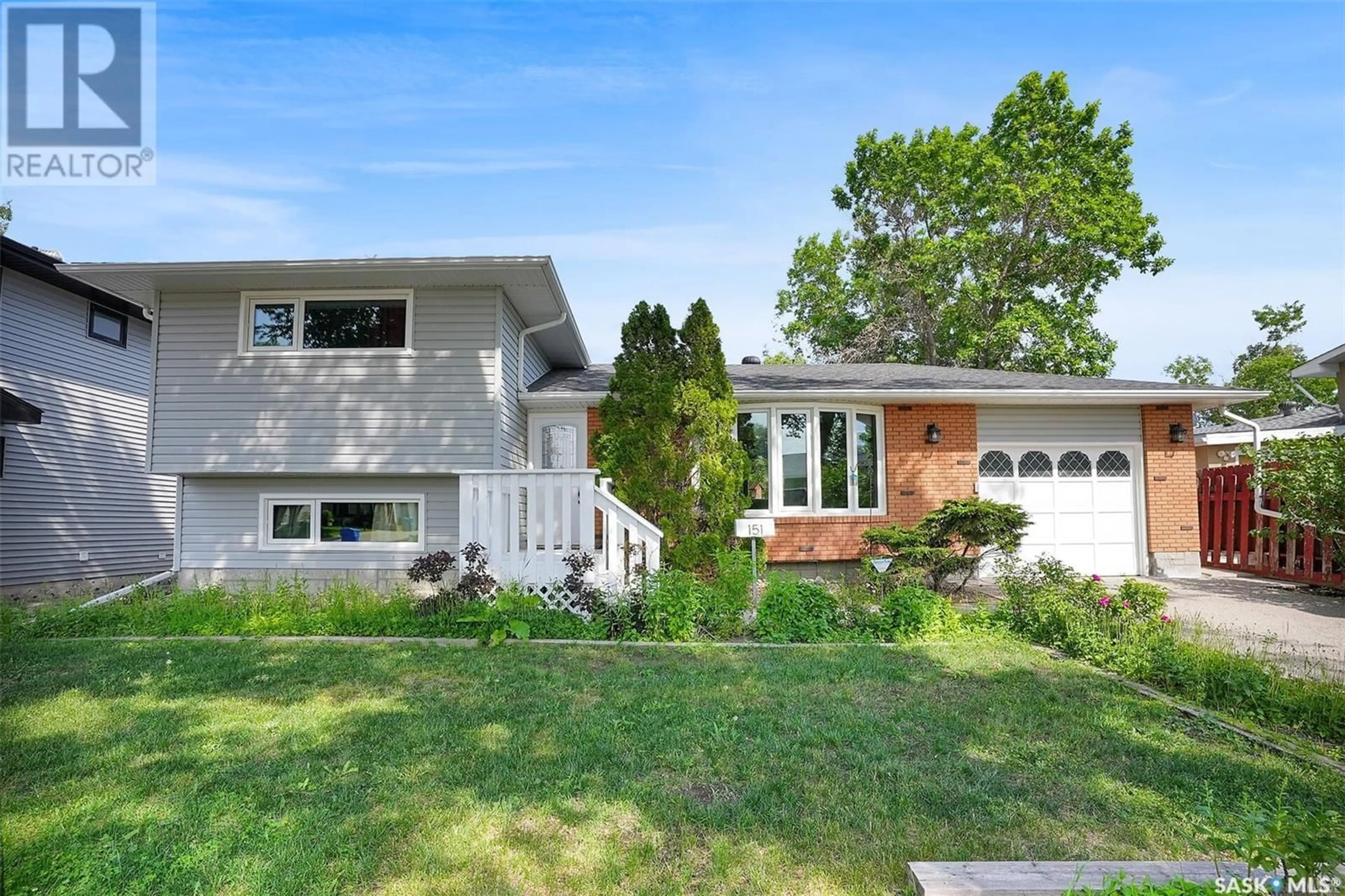 Home with vinyl exterior material, street for 151 LAUBACH CRESCENT, Regina Saskatchewan S4S6M2