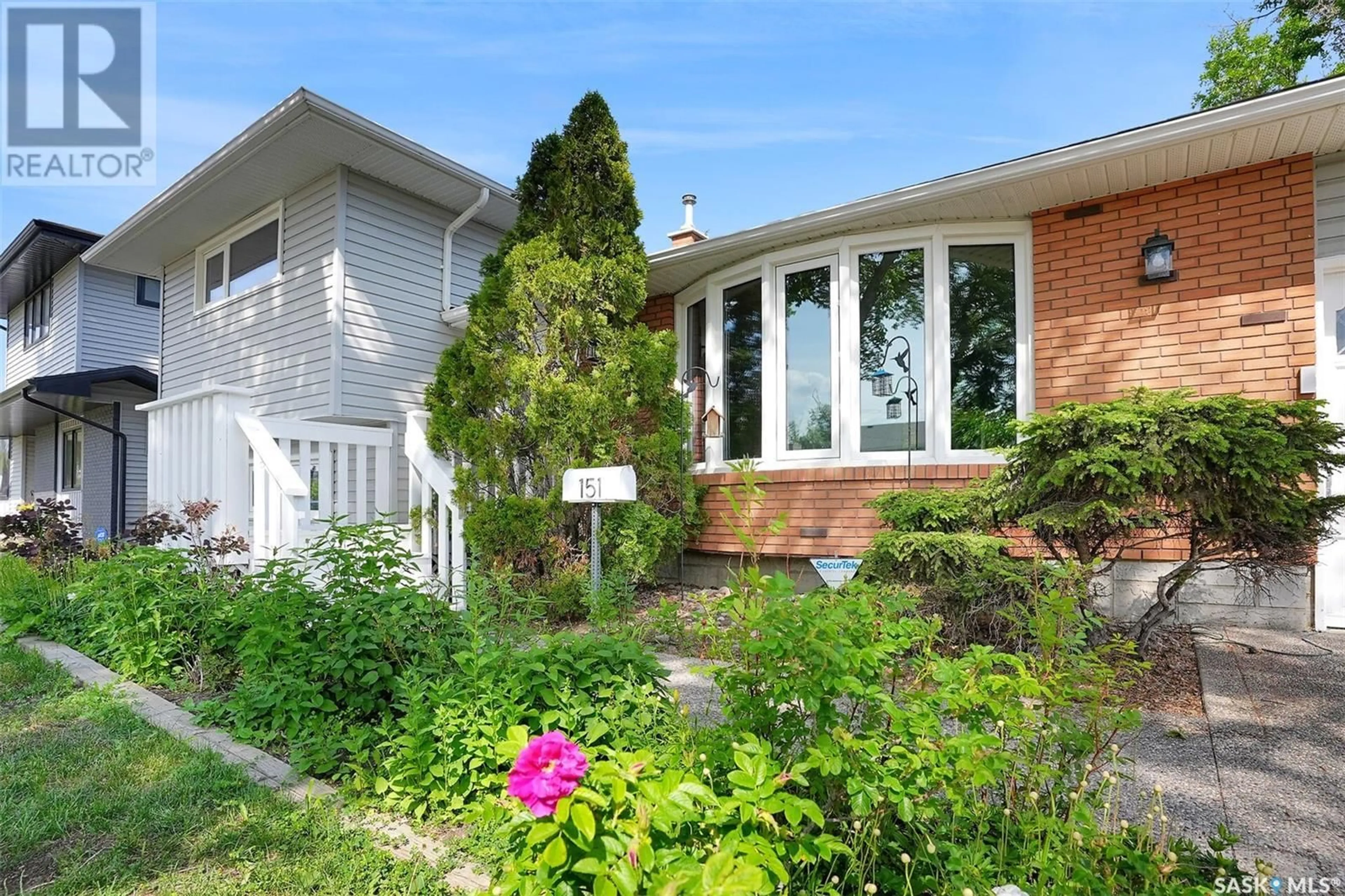 Home with brick exterior material, street for 151 LAUBACH CRESCENT, Regina Saskatchewan S4S6M2