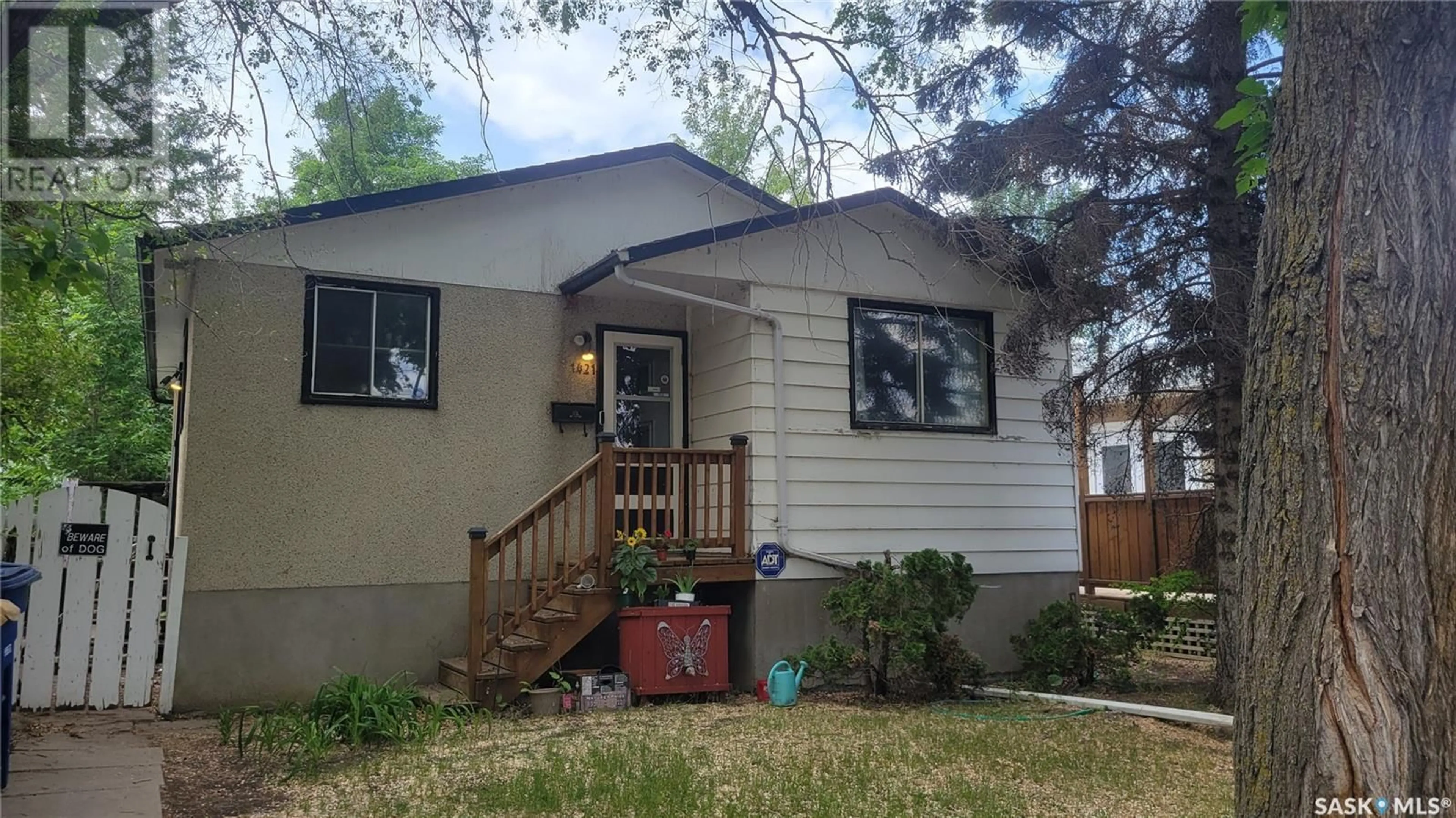 Home with vinyl exterior material, street for 1421 HNATYSHYN AVENUE, Saskatoon Saskatchewan S7L4G6