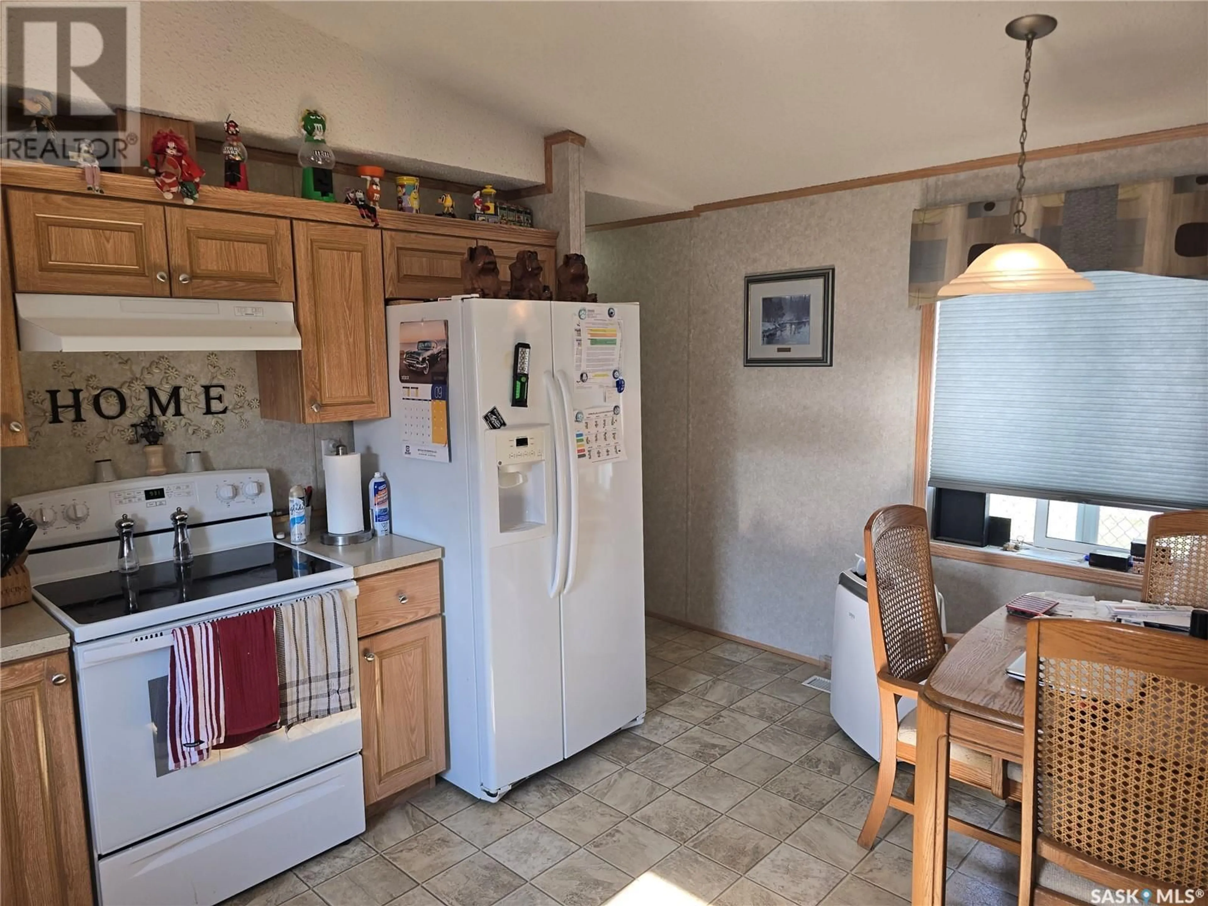 Standard kitchen, ceramic/tile floor for E - 616 LITTLE QUILL AVENUE, Wynyard Saskatchewan S0A4T0