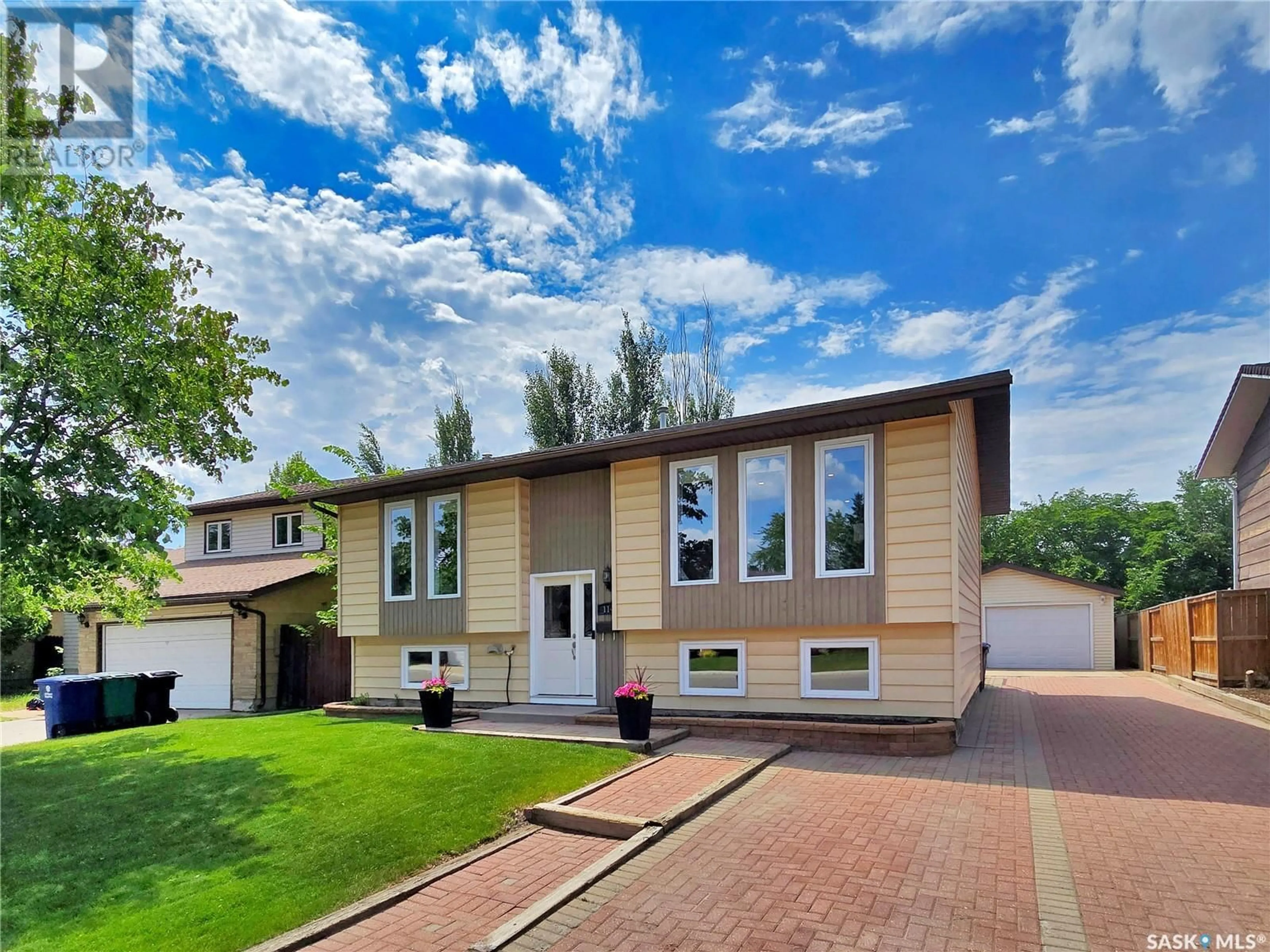 Home with vinyl exterior material, street for 114 DELAYEN CRESCENT, Saskatoon Saskatchewan S7N2V6