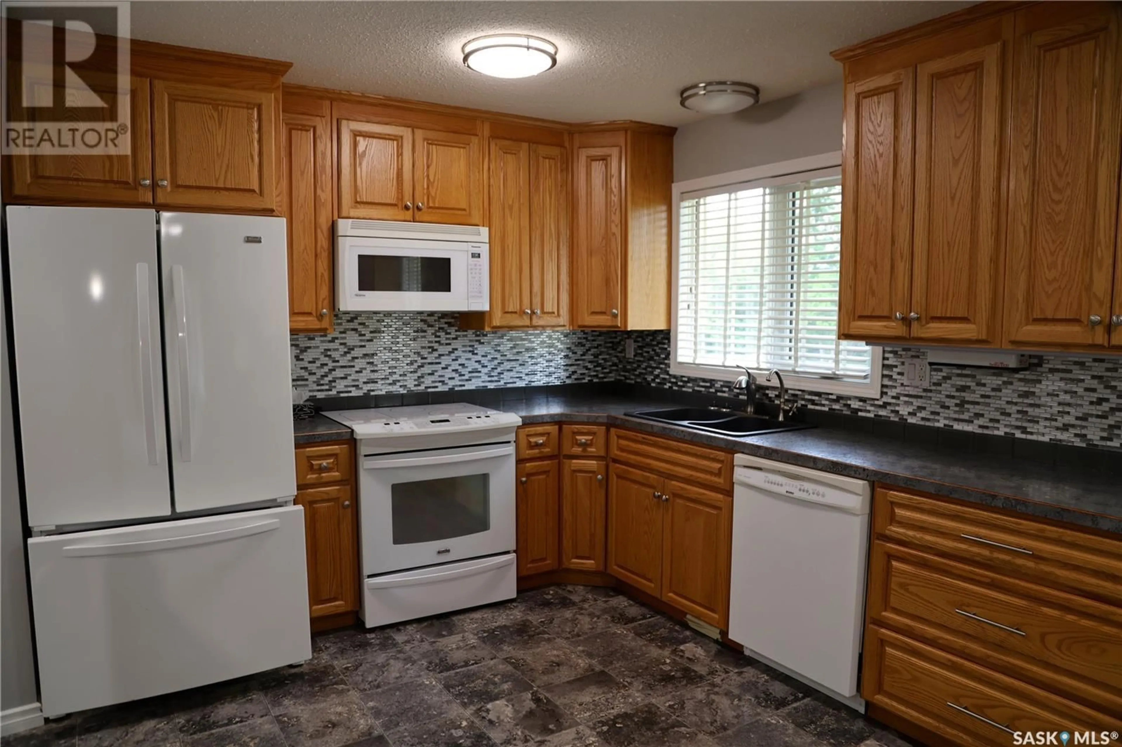 Standard kitchen, ceramic/tile floor for 106 BOSWELL STREET, Neudorf Saskatchewan S0A2T0