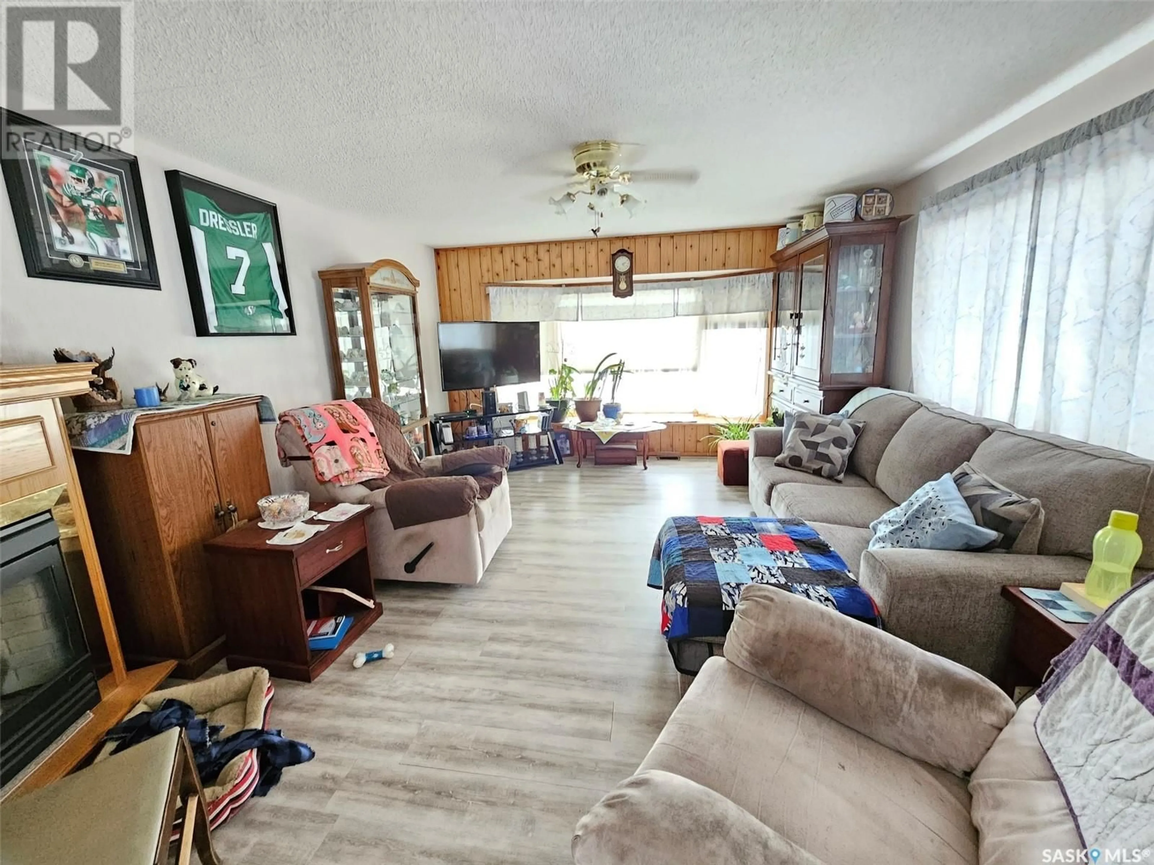 Living room with furniture, unknown for 323 6TH STREET, Carlyle Saskatchewan S0C0R0