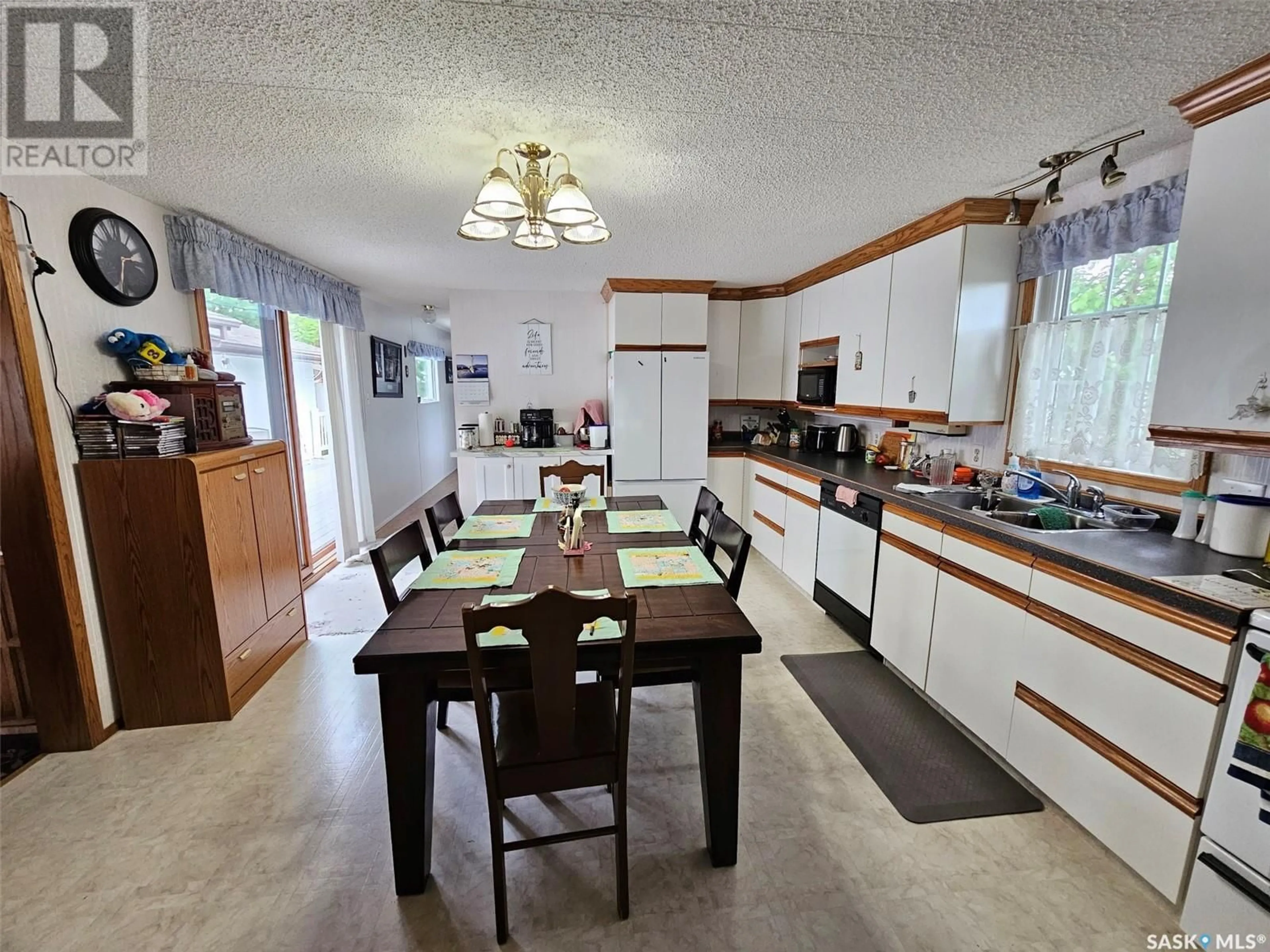 Open concept kitchen, ceramic/tile floor for 323 6TH STREET, Carlyle Saskatchewan S0C0R0