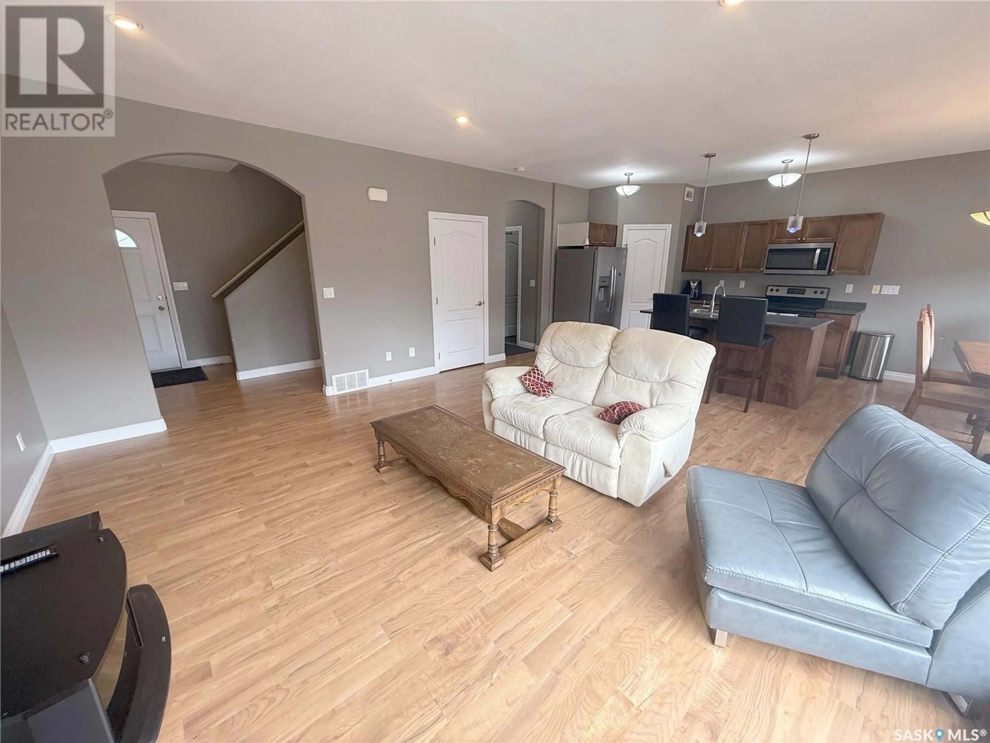 Living room with furniture, unknown for 135 WEST HAMPTON BOULEVARD, Saskatoon Saskatchewan S7R0B7