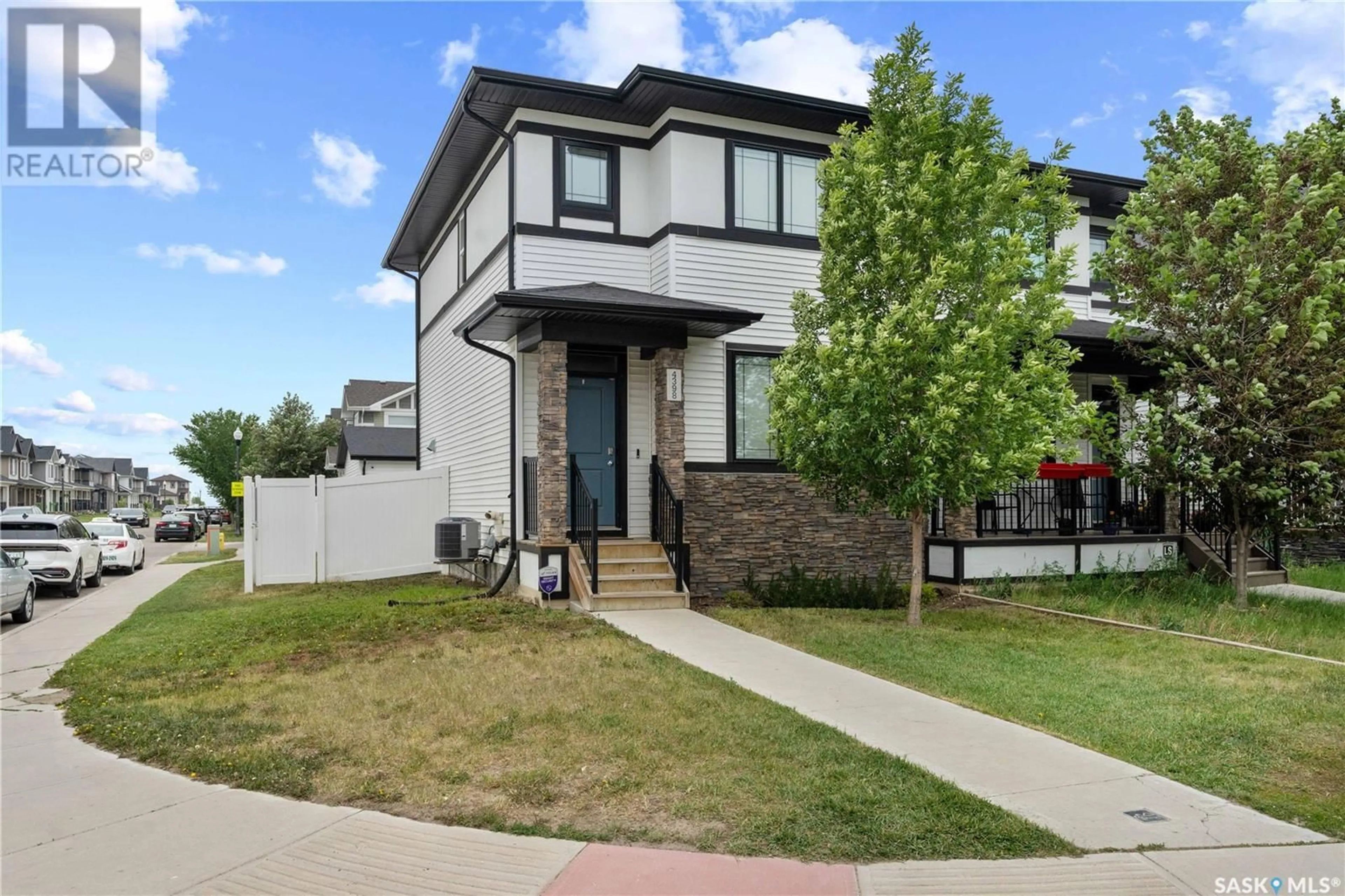 Home with vinyl exterior material, street for 4398 JAMES HILL ROAD, Regina Saskatchewan S4W0P7