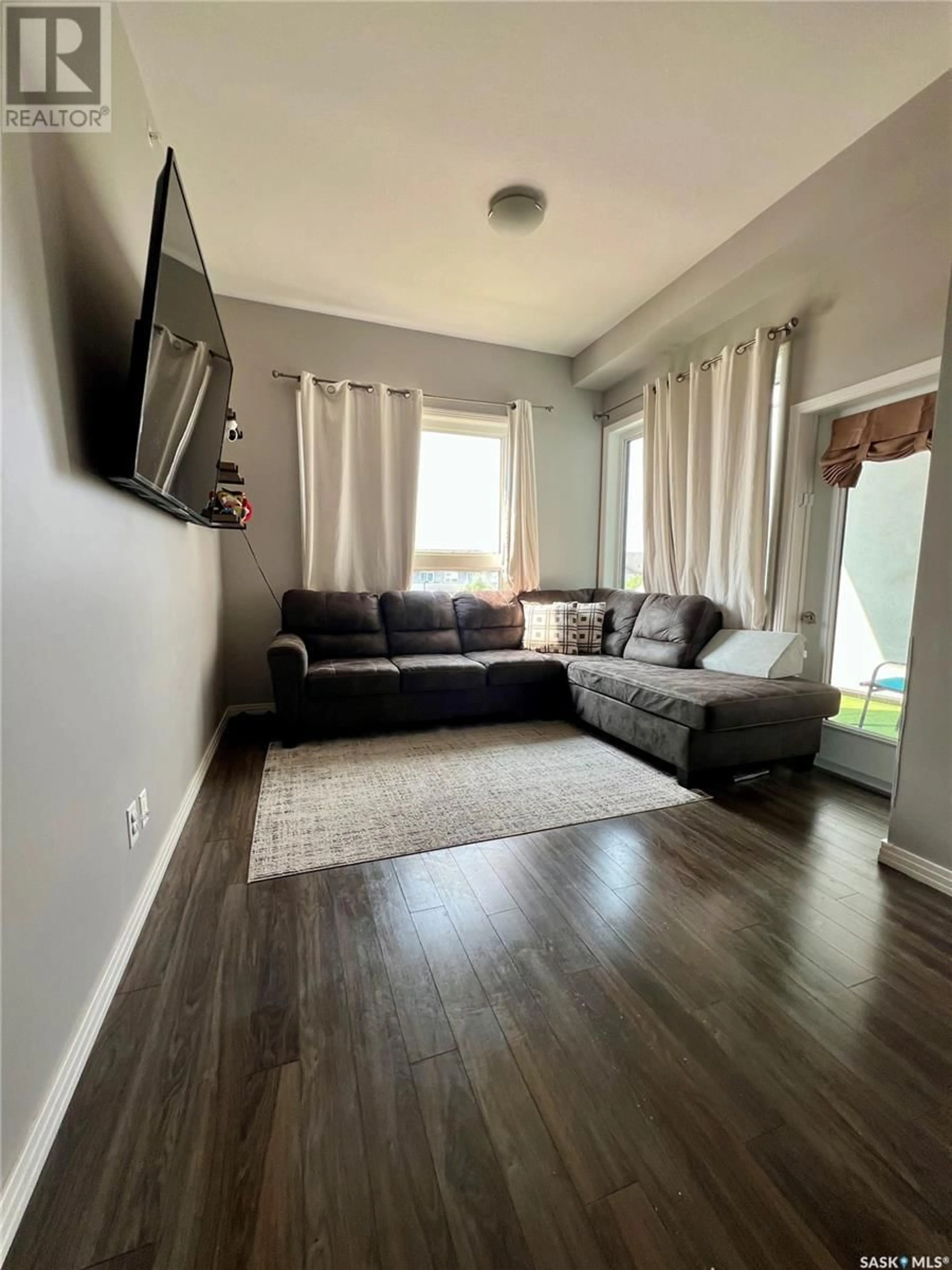 Living room with furniture, unknown for 225 - 309 MANINGAS BEND, Saskatoon Saskatchewan S7W0P9