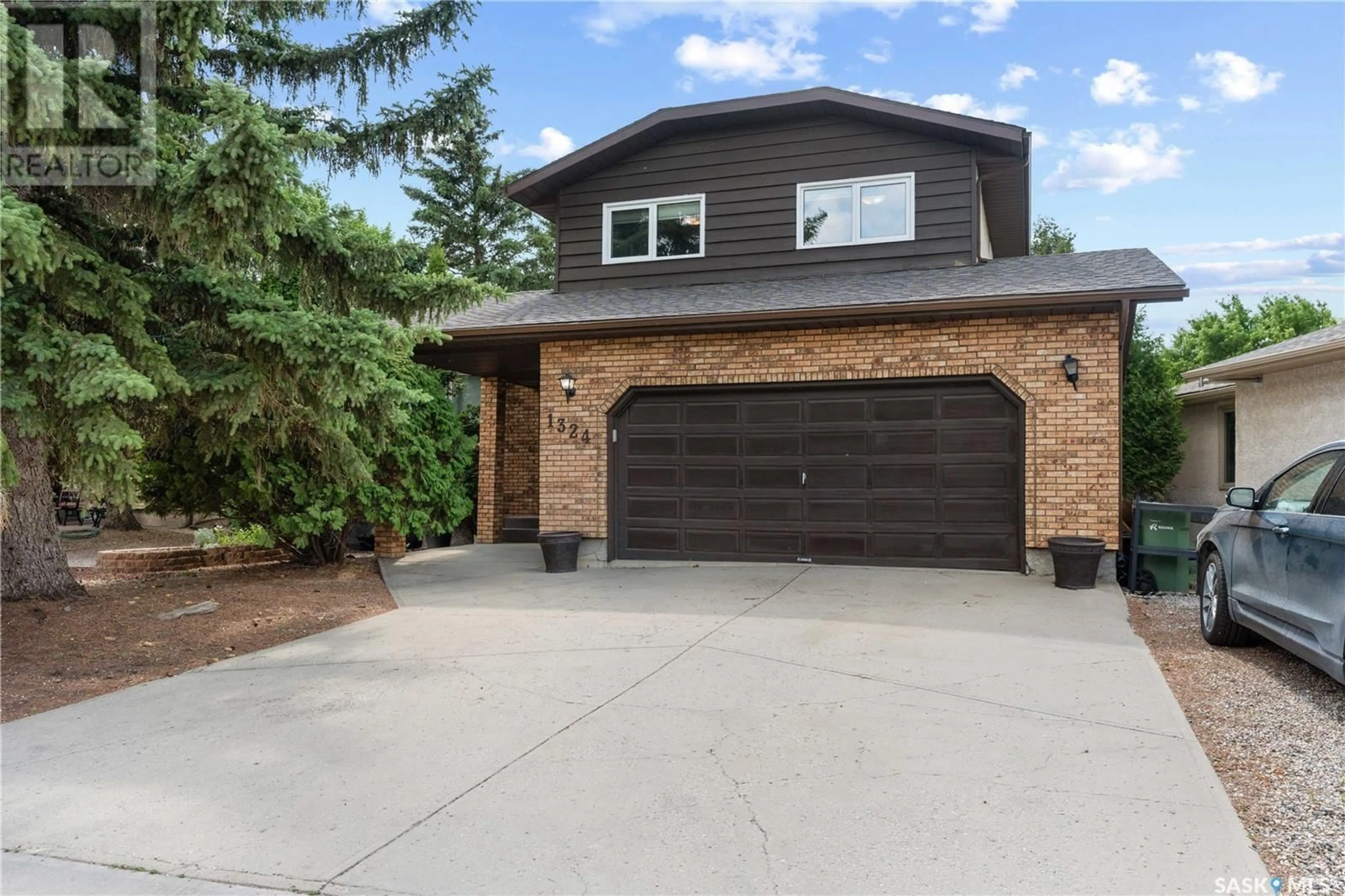 Home with brick exterior material, street for 1324 LAKEWOOD DRIVE, Regina Saskatchewan S4X3L4
