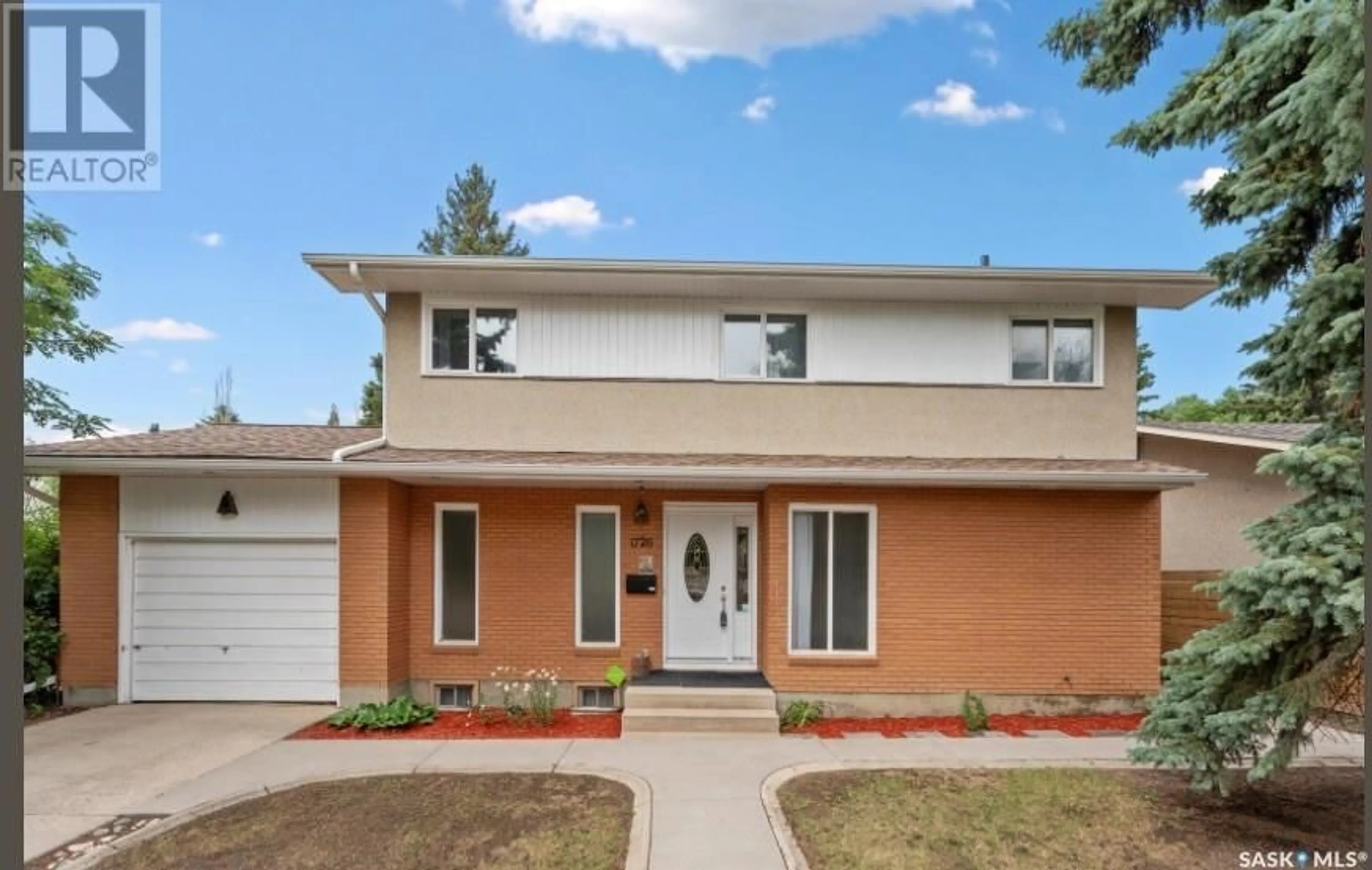 Home with brick exterior material, street for 1726 ARLINGTON AVENUE, Saskatoon Saskatchewan S7H2Y7