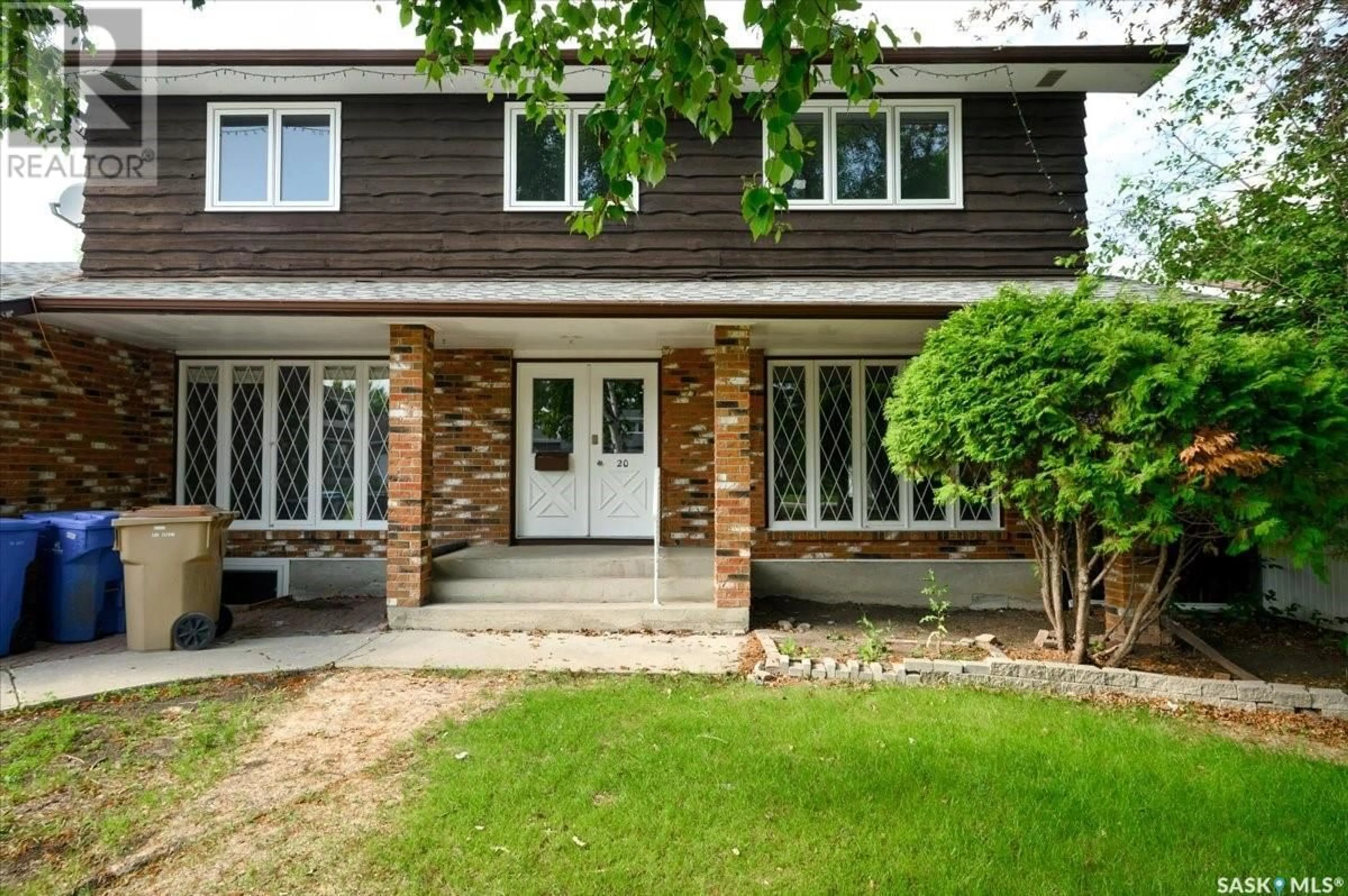 Home with brick exterior material, street for 20 LANCASTER PLACE, Regina Saskatchewan S4S2S4
