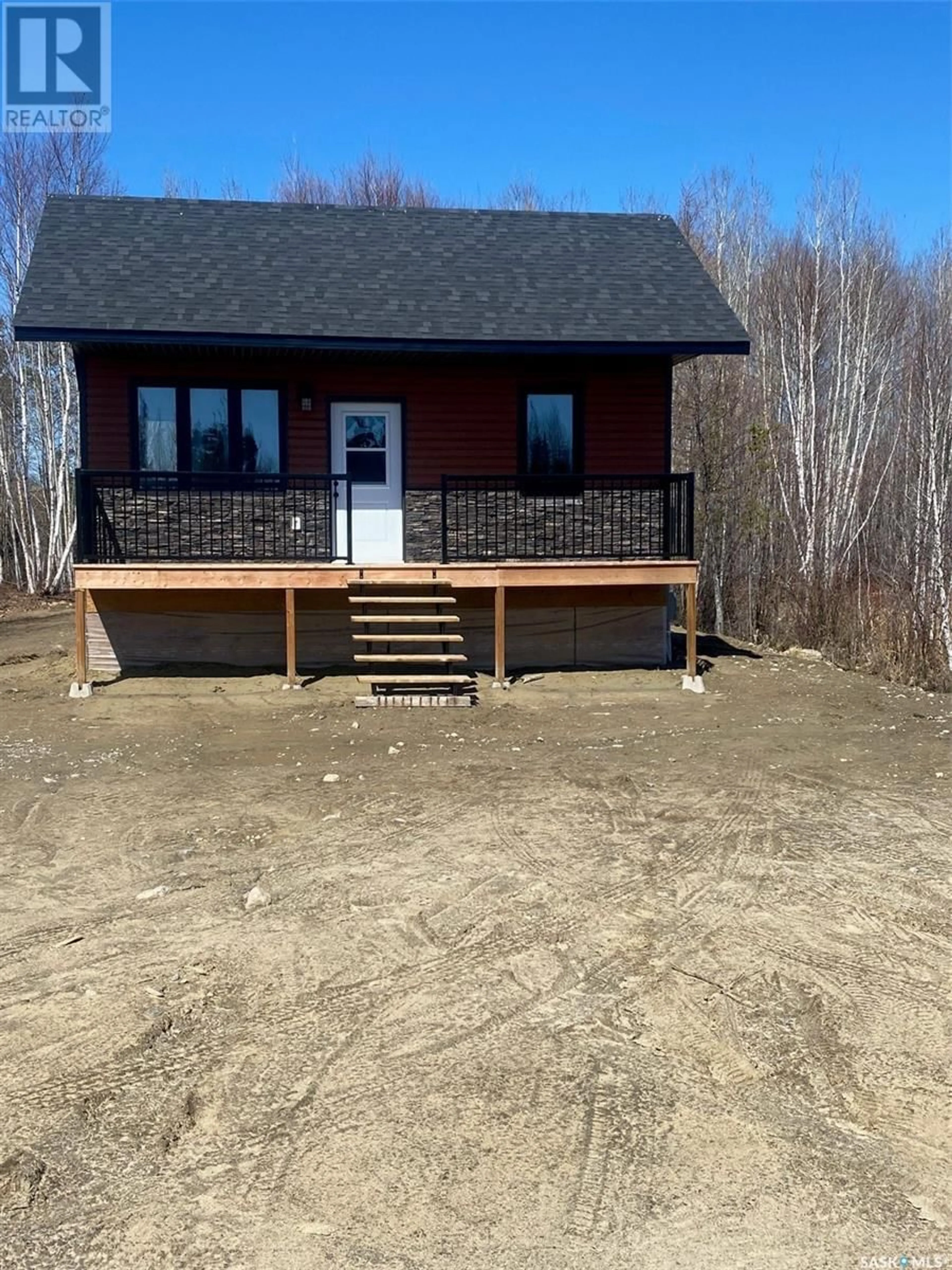 A pic from outside/outdoor area/front of a property/back of a property/a pic from drone, building for 127 WALLY HUNT DRIVE, La Ronge Saskatchewan S0J1L0