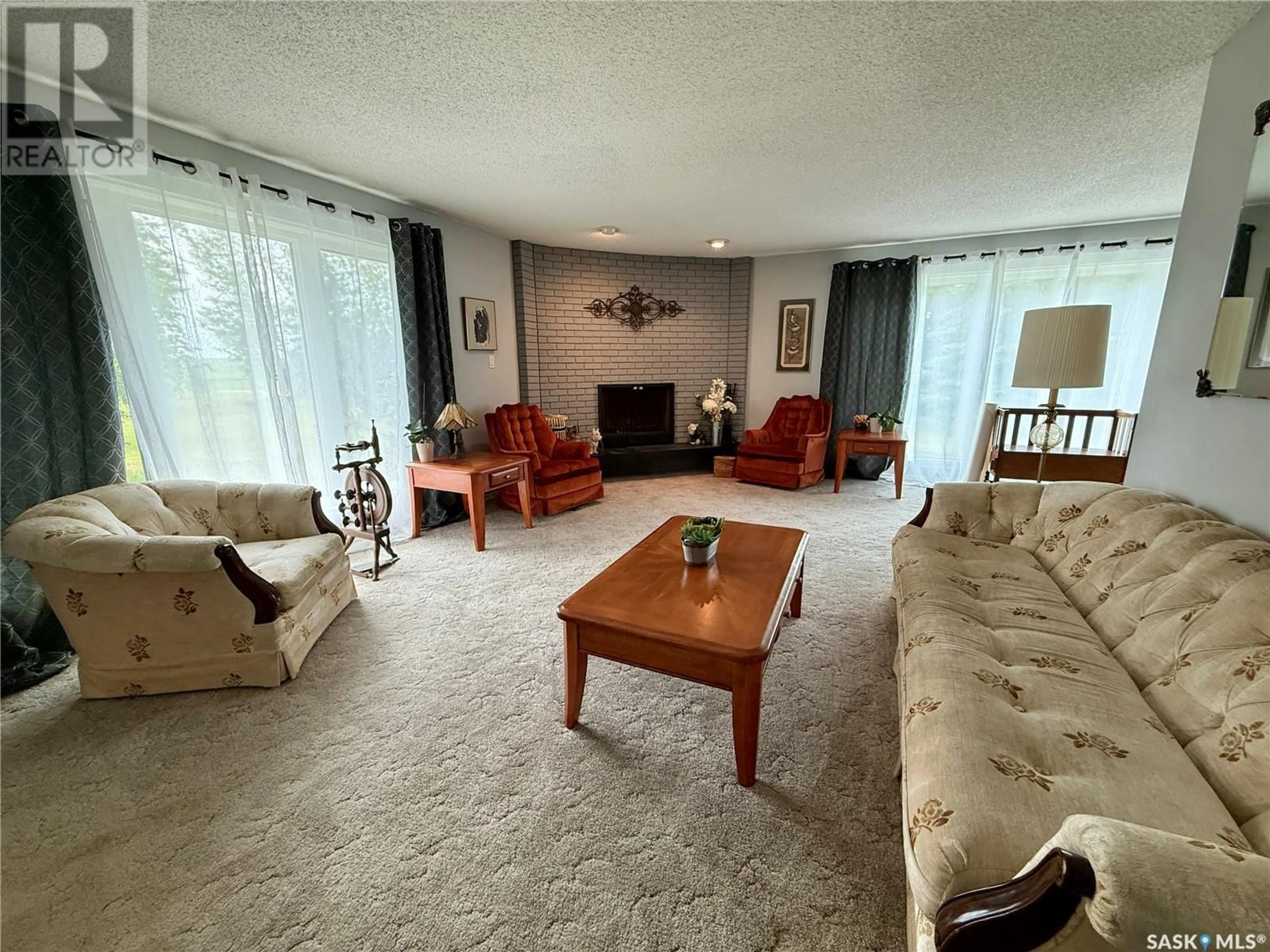 Living room with furniture, unknown for COOPER ACREAGE, North Battleford Rm No. 437 Saskatchewan S9A2X3
