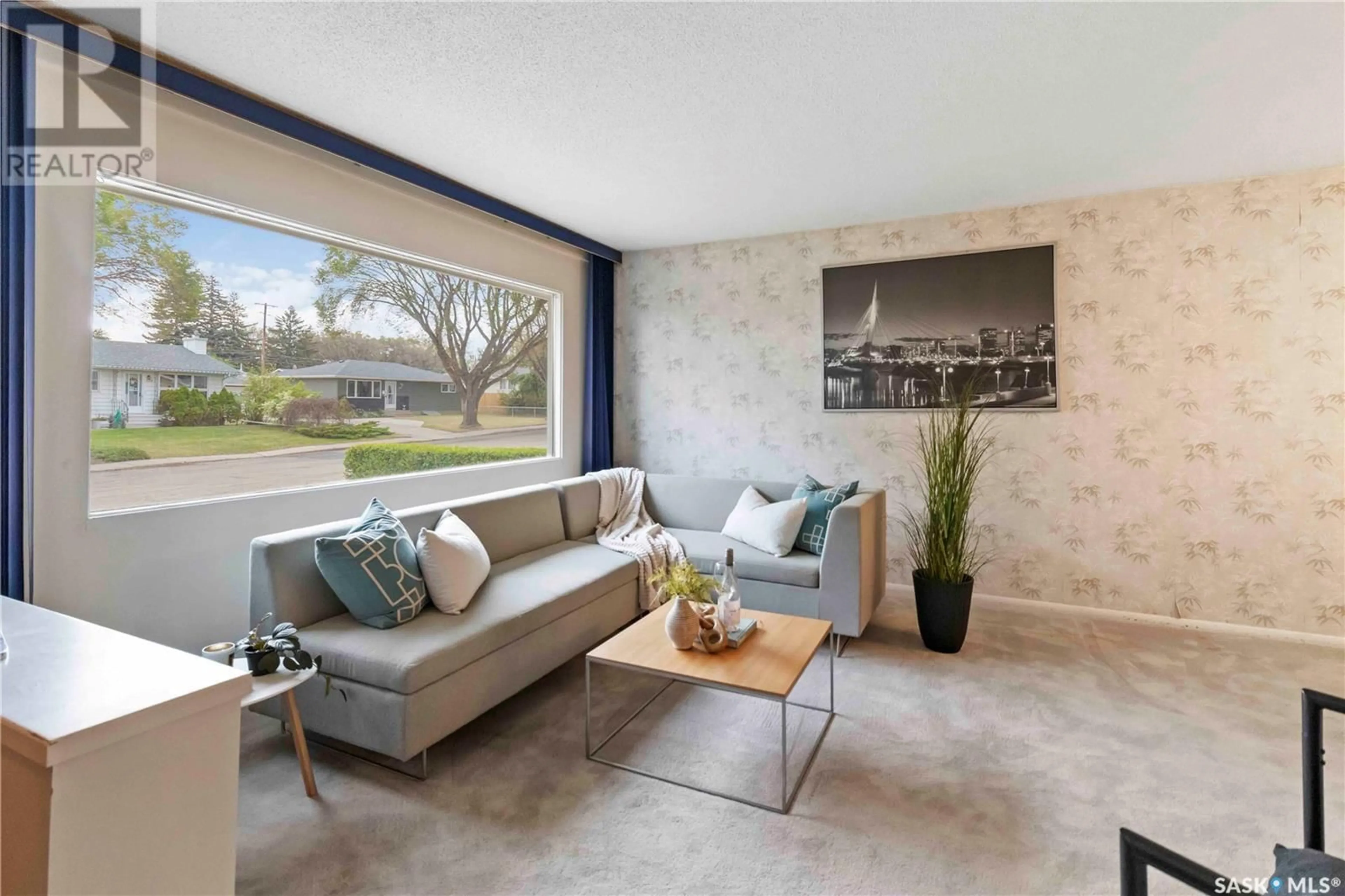 Living room with furniture, cement floor for 123 MONTREAL AVENUE, Saskatoon Saskatchewan S7M3K9