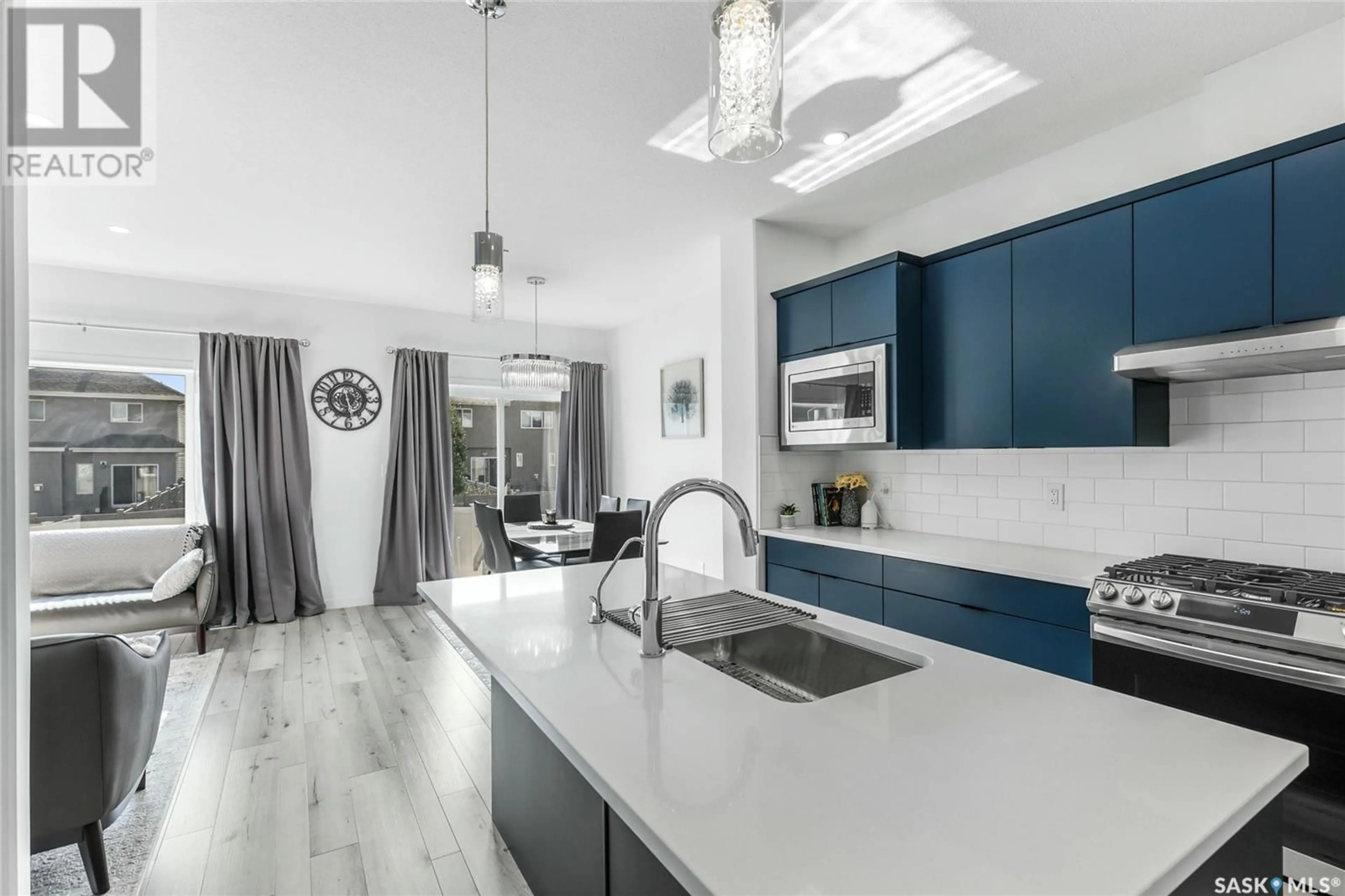Open concept kitchen, ceramic/tile floor for 3518 GREEN TURTLE ROAD, Regina Saskatchewan S4V3N8