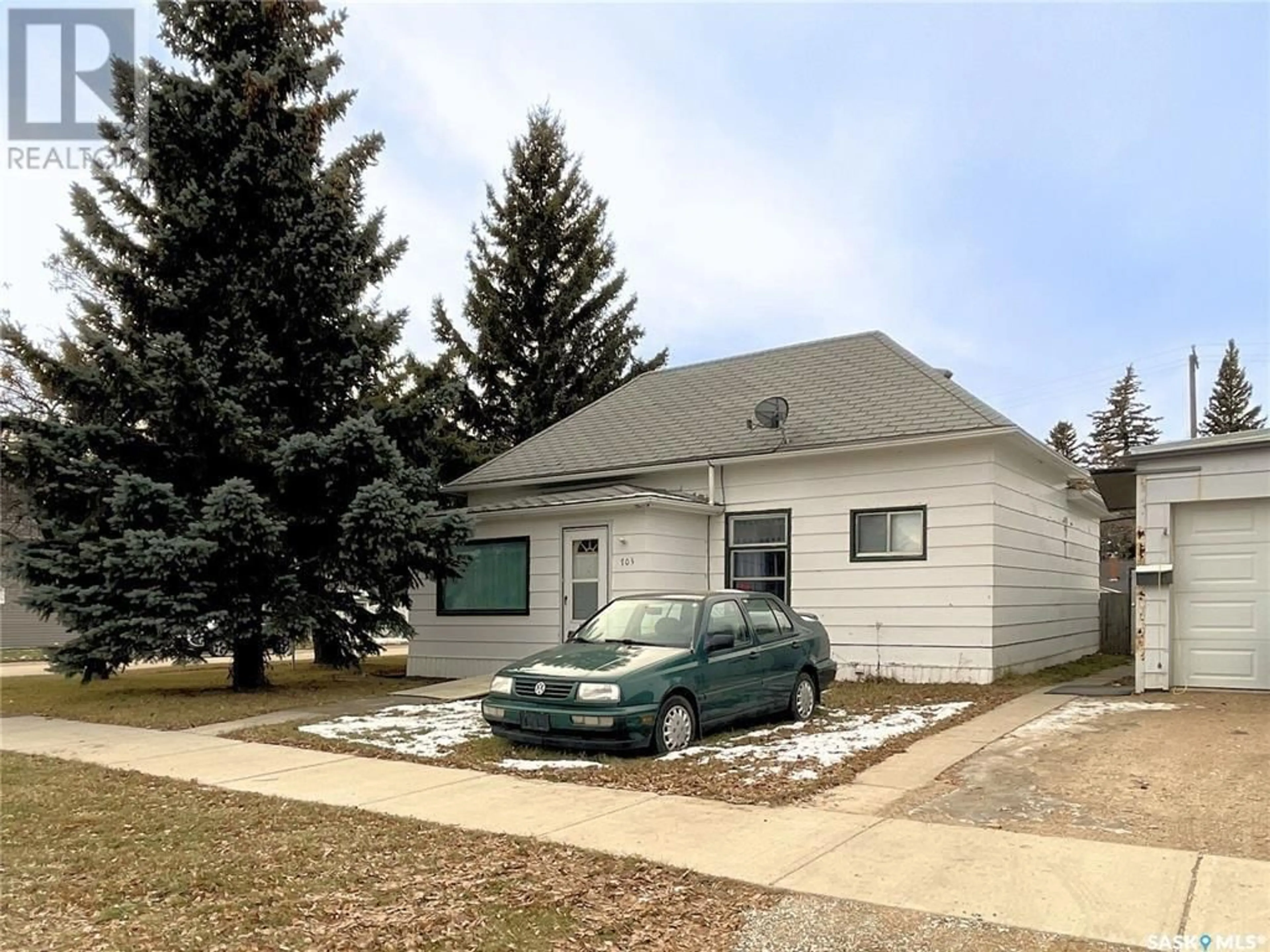 Home with vinyl exterior material, street for 703 5TH STREET, Humboldt Saskatchewan S0K2A0