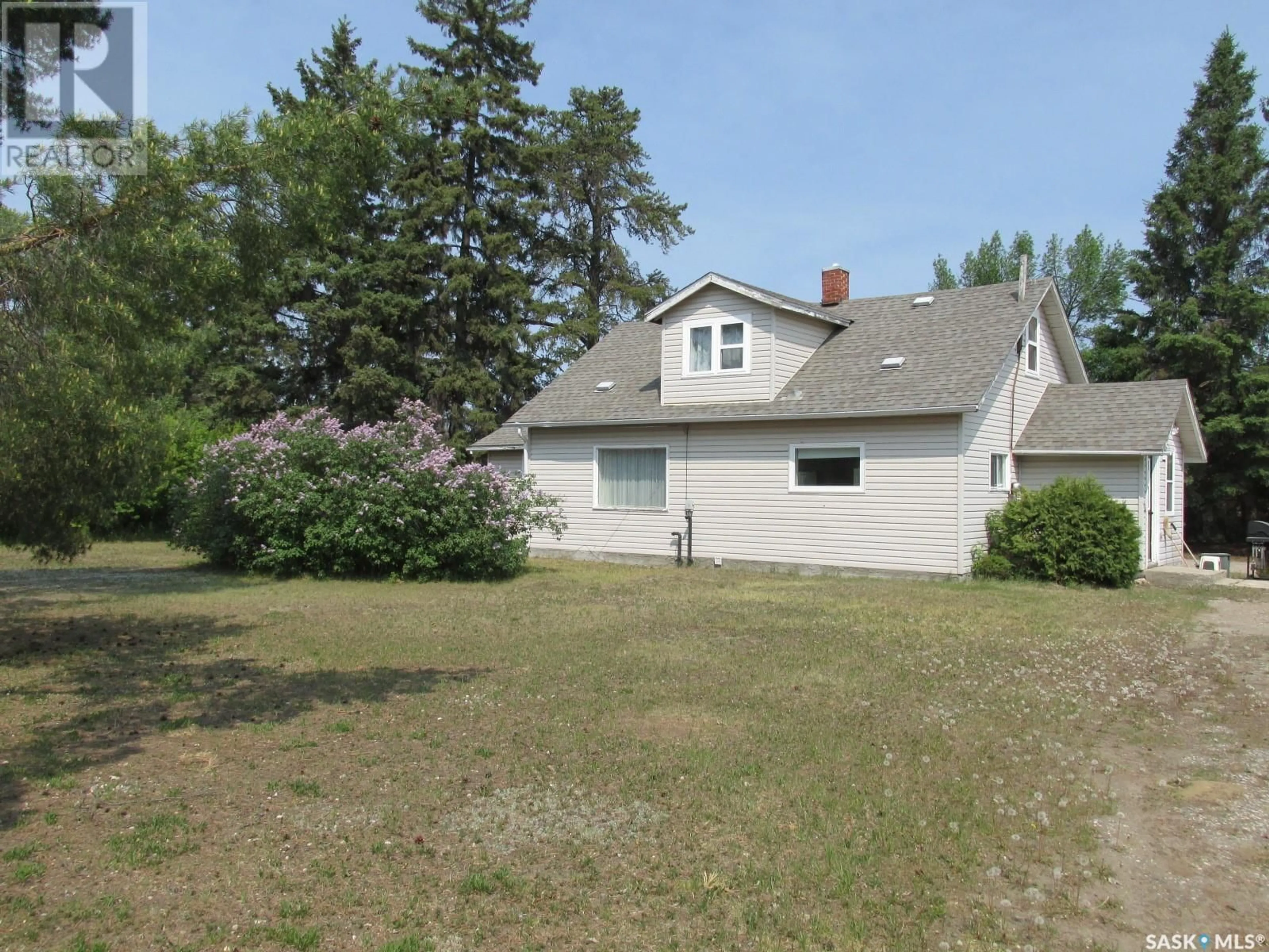 A pic from outside/outdoor area/front of a property/back of a property/a pic from drone, unknown for 115 LUCILLE CRESCENT, Nipawin Saskatchewan S0E1E0