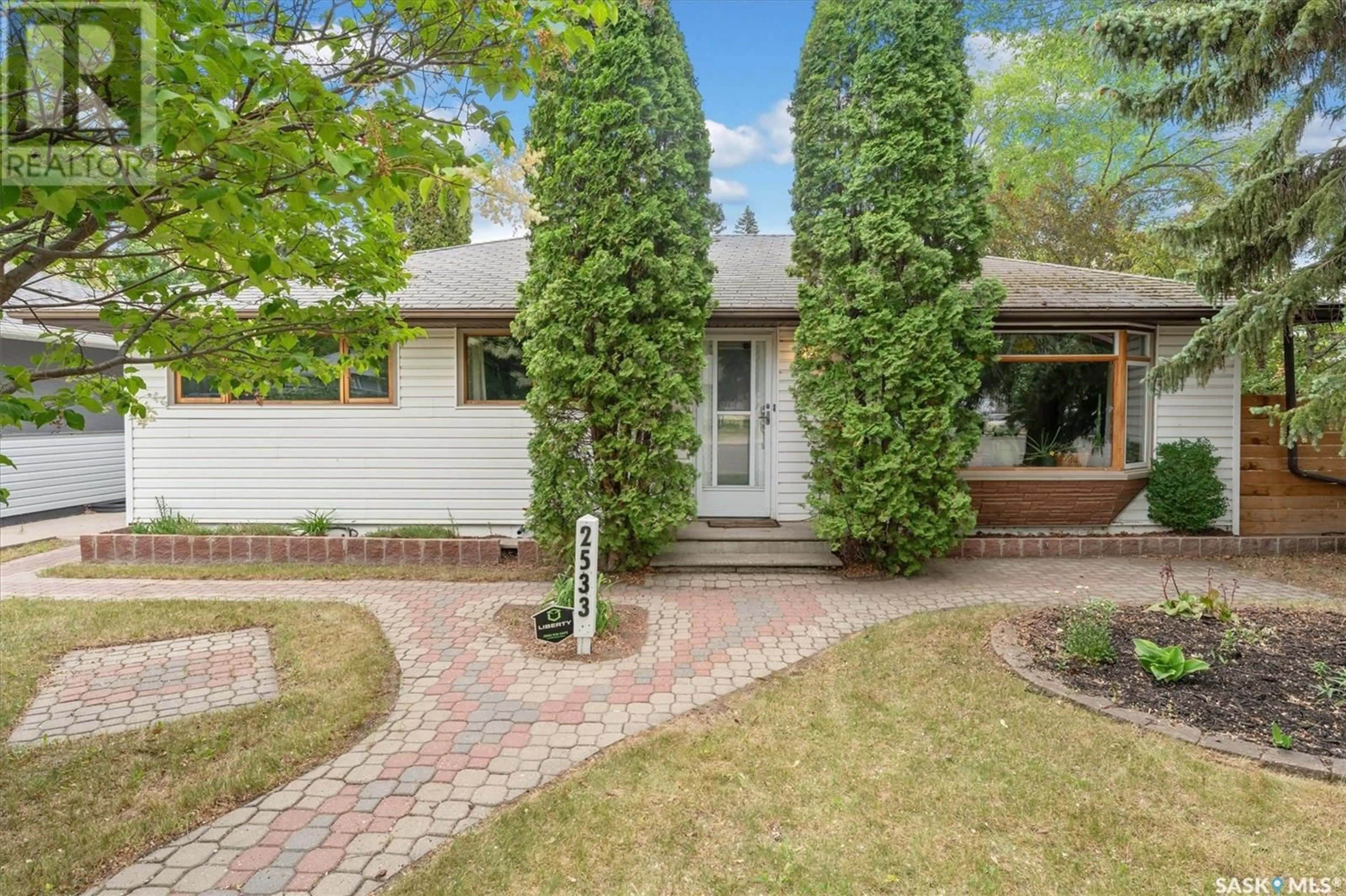 Home with brick exterior material, street for 2533 WILLIAM AVENUE, Saskatoon Saskatchewan S7J1B2