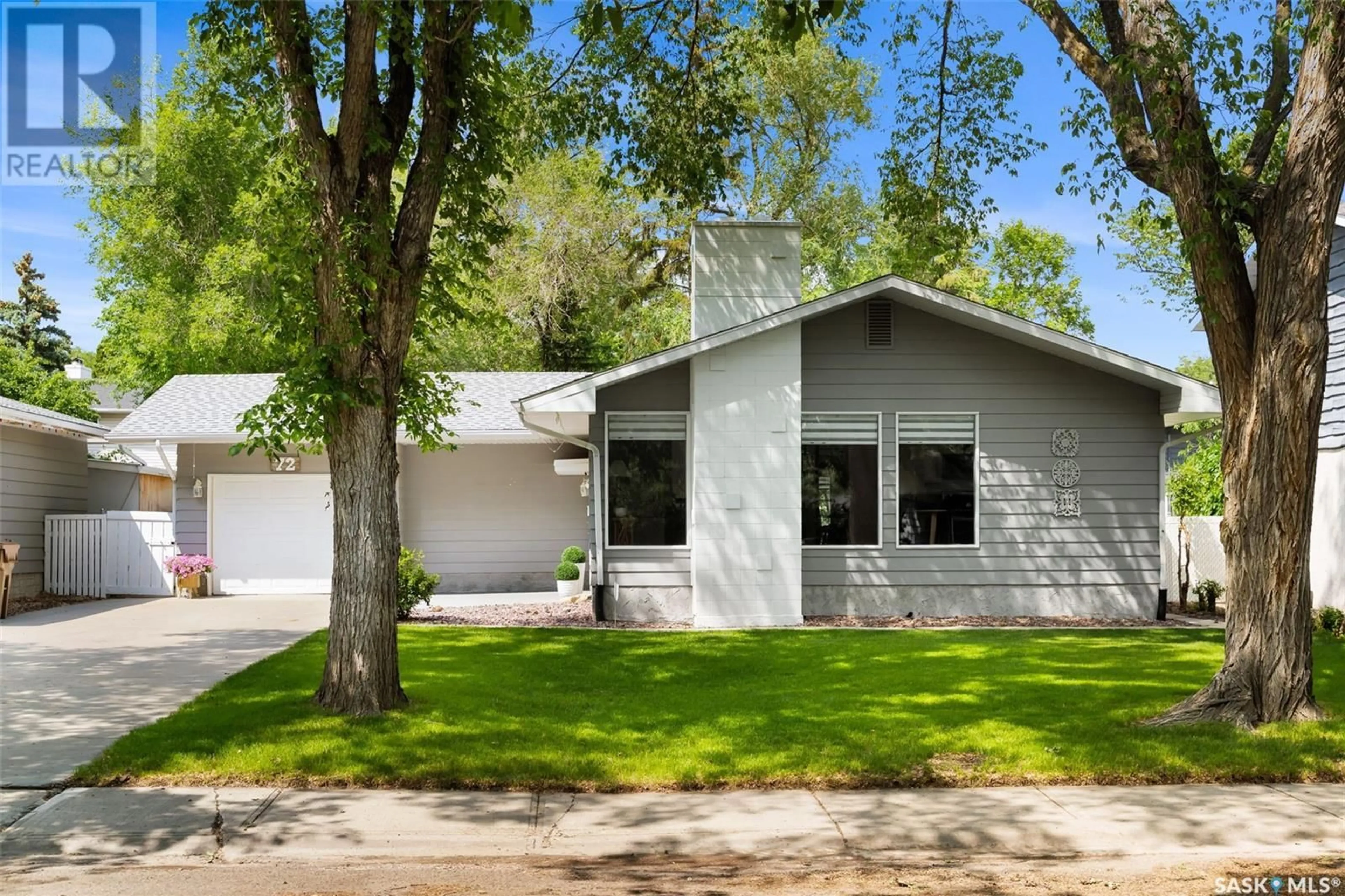 Home with vinyl exterior material, street for 72 TIBBITS ROAD, Regina Saskatchewan S4S2Z1