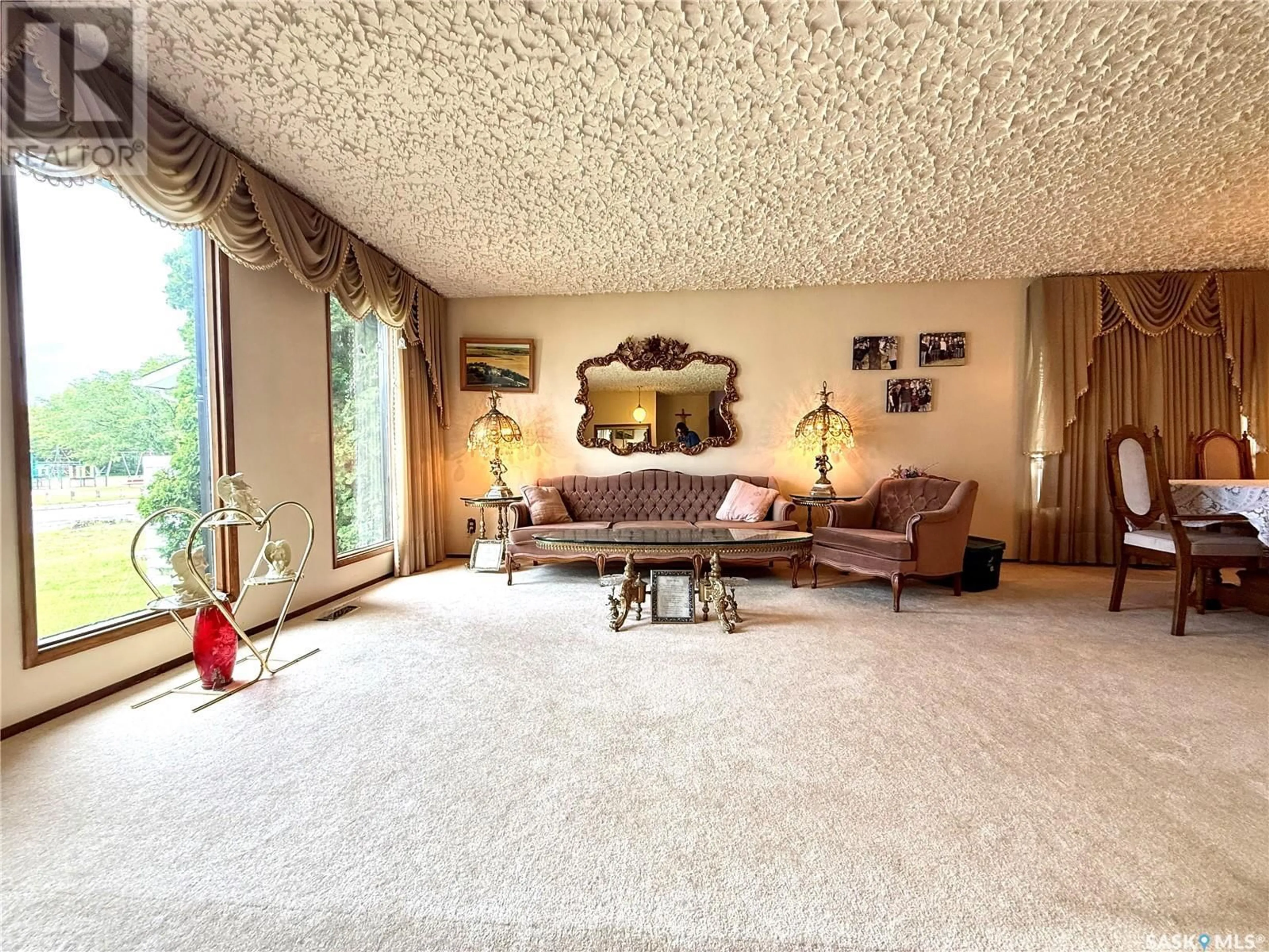 Living room with furniture, carpet floor for 56 MCBURNEY DRIVE, Yorkton Saskatchewan S3N3J1