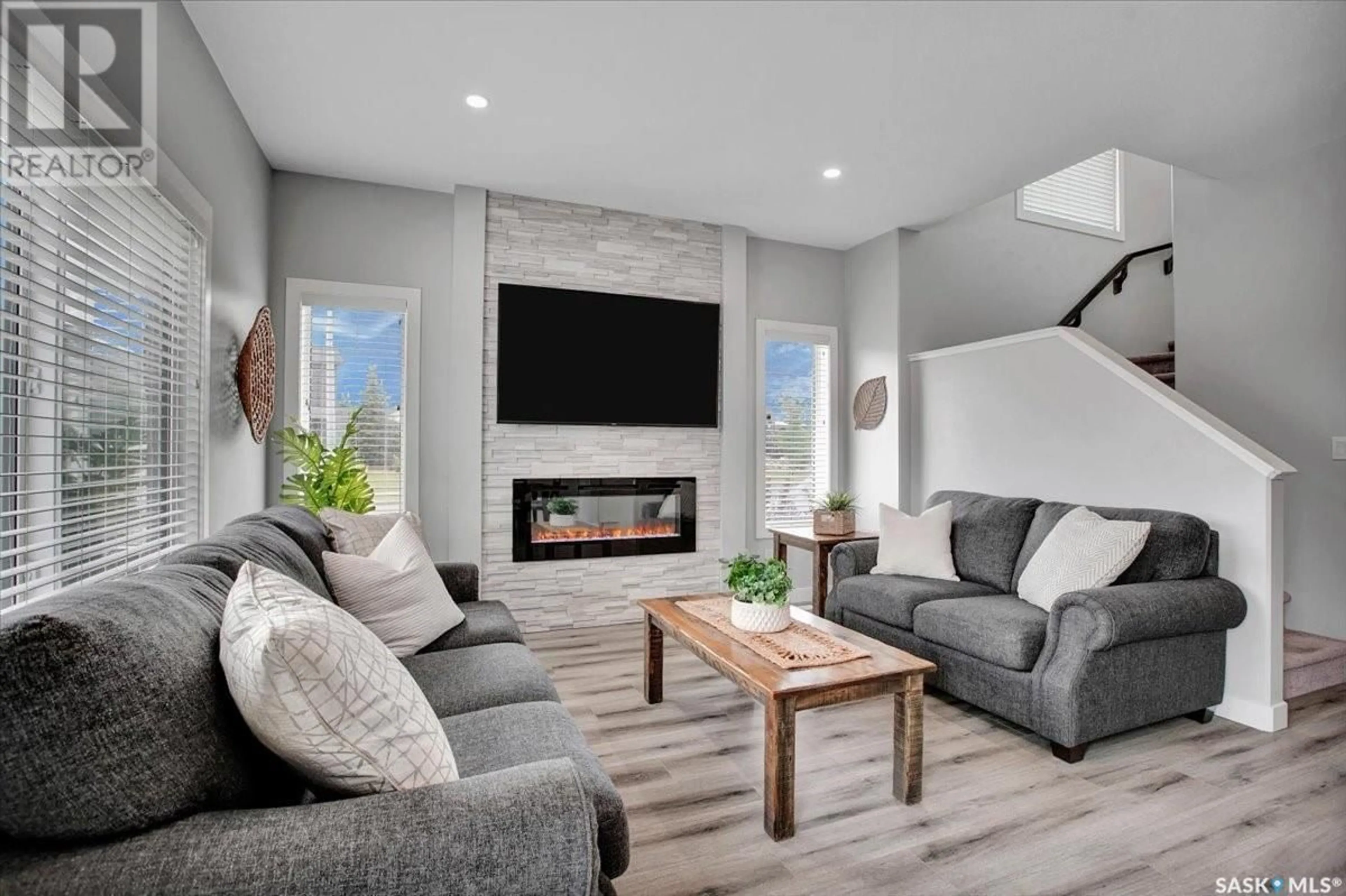 Living room with furniture, unknown for 12 525 MAHABIR LANE, Saskatoon Saskatchewan S7W1G1