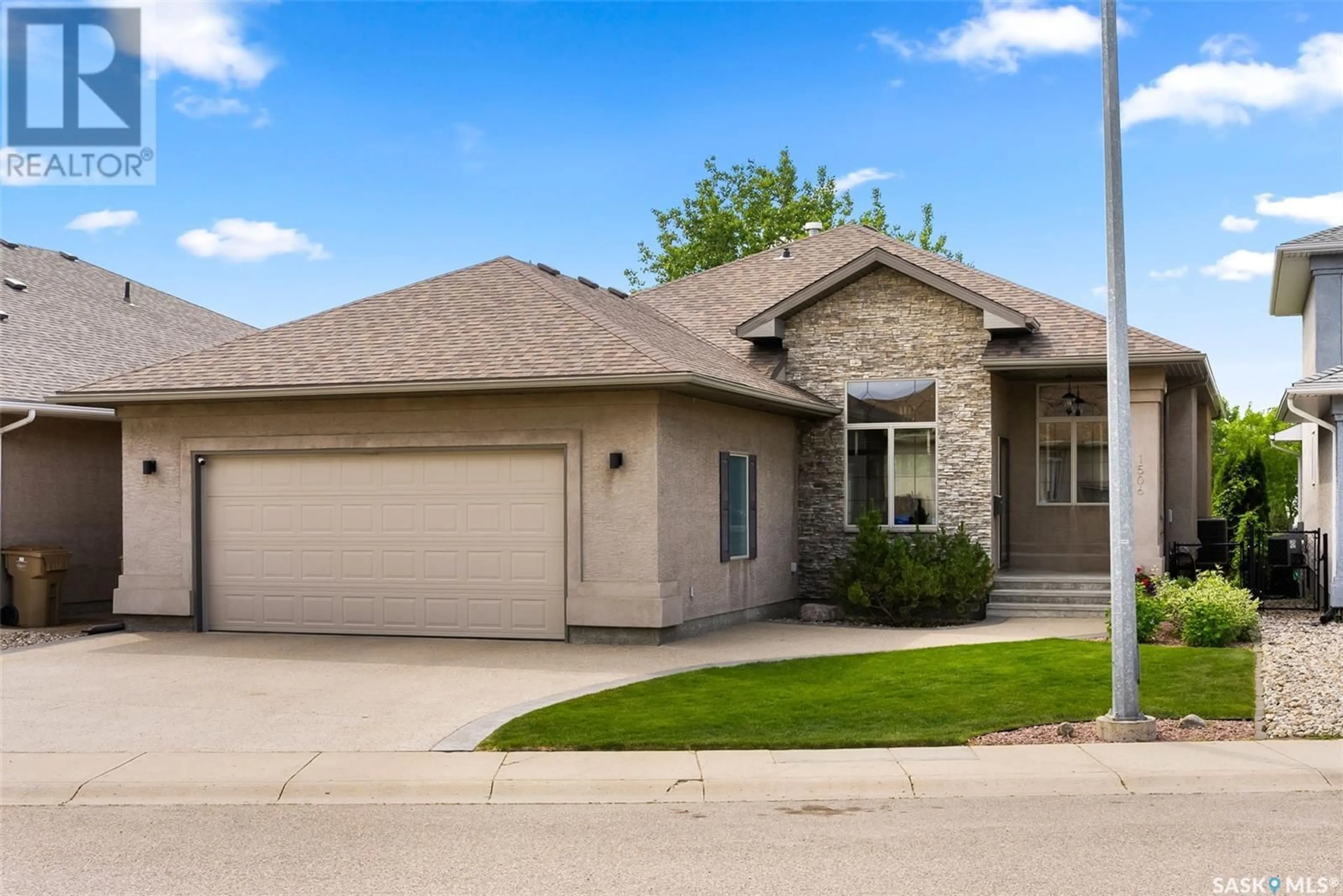 Home with brick exterior material, street for 1506 LAKERIDGE DRIVE, Regina Saskatchewan S4X4L5
